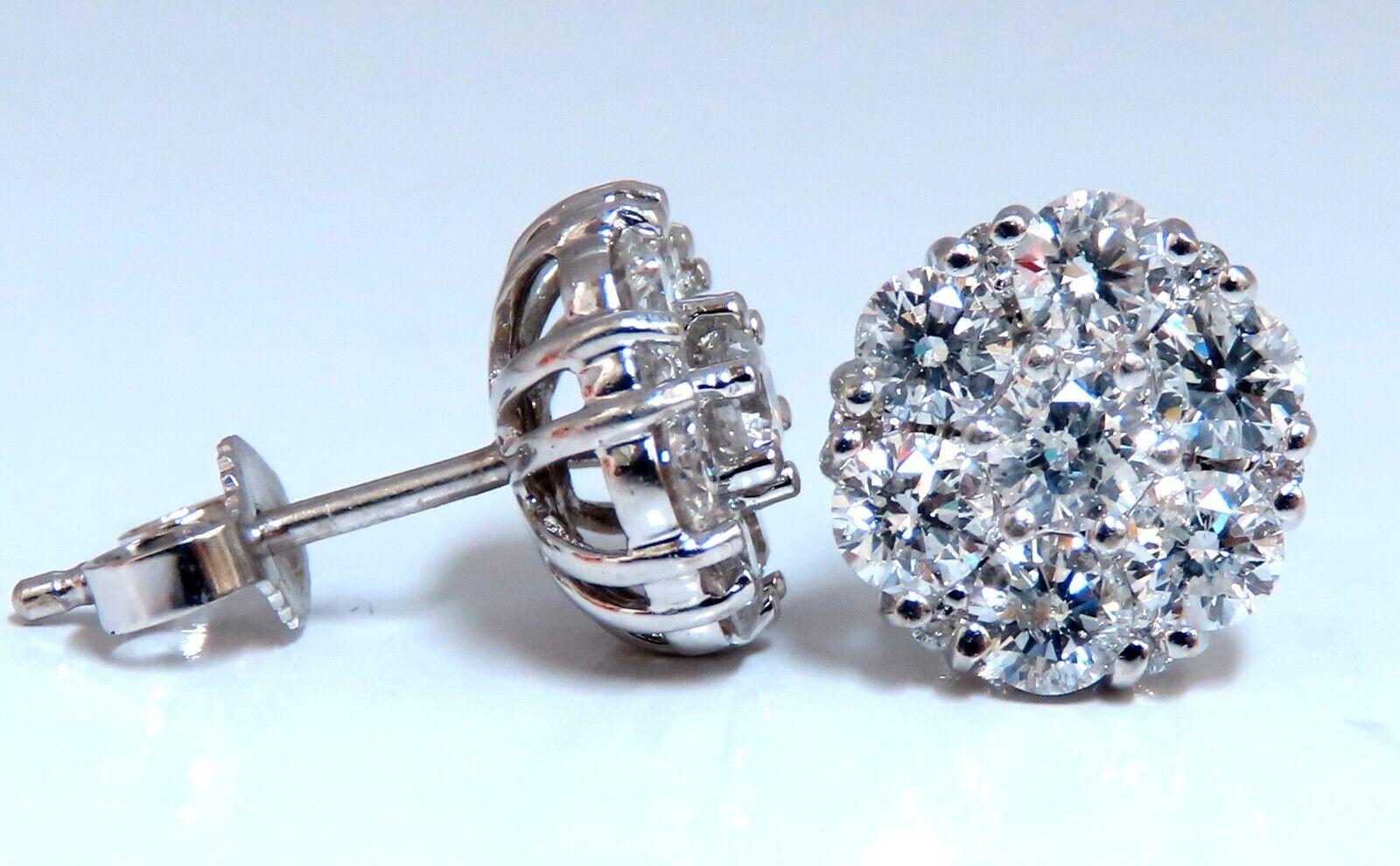 Cluster diamond earrings.

1.50 carat natural round diamonds

G - color vs2  clarity

14 karat white gold 3.2 grams

Earrings measure 9.8 mm wide

$11,000 appraisal certificate to accompany