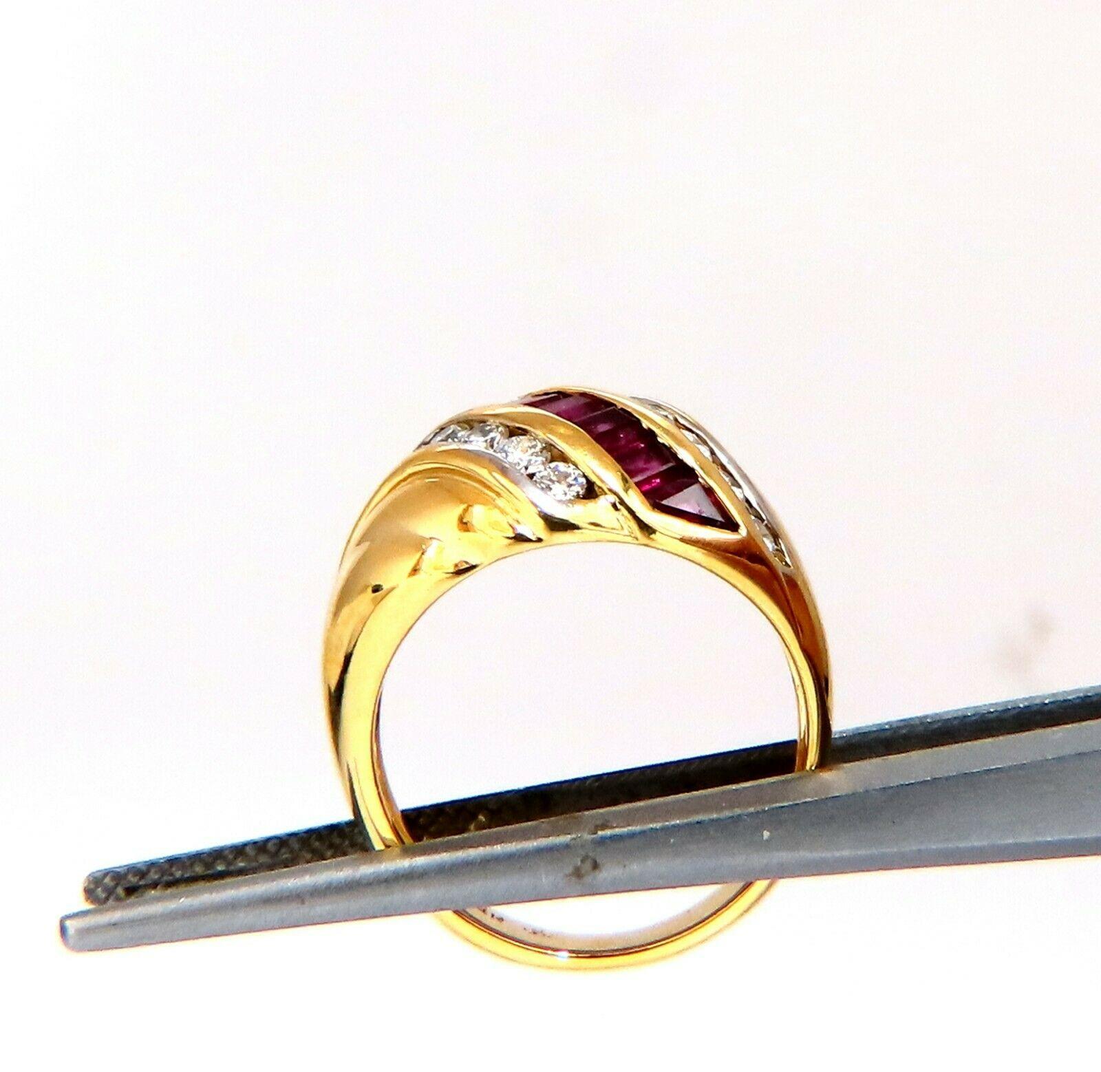 1ct natural baguette Ruby band.

Dome mounted single stripe, wave pattern.

Clean clarity vivid red and transparent.

.50 carat natural round side diamonds H color vs2 clarity

Ring is 13.5 mm wide

5.6 mm depth.

14 karat yellow gold 6.5