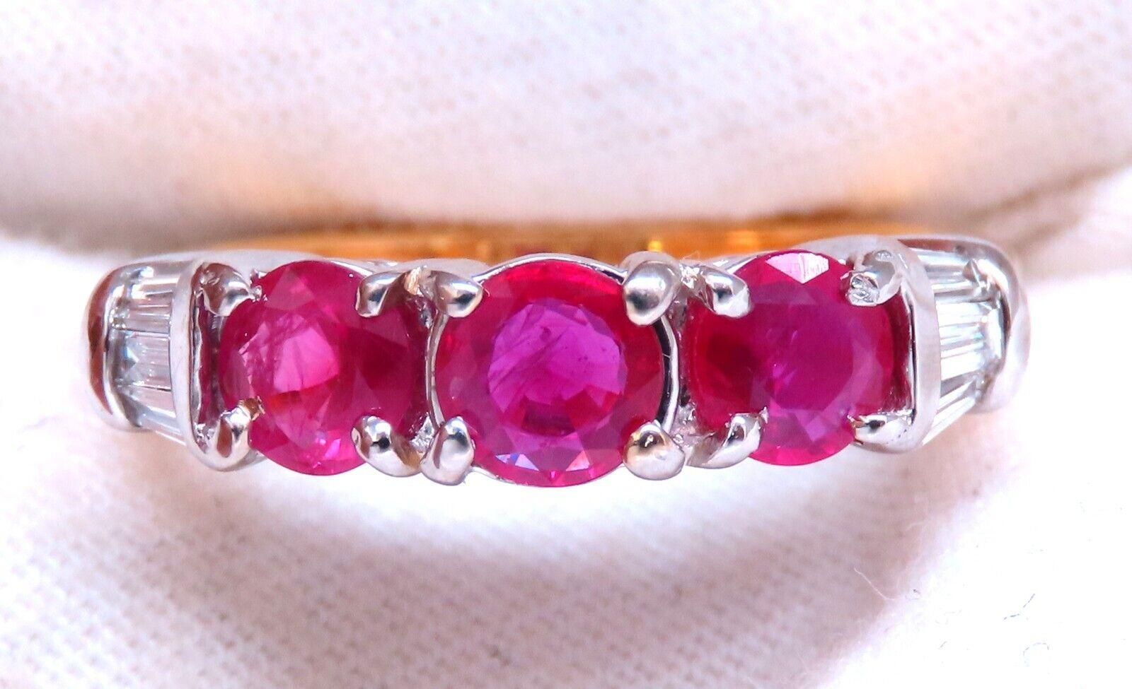 1.50ct Natural Rubies Ring.

Round  Brilliant Cut

4mm each

.25ct. Side baguette Diamonds:

H-color Vs-2 clarity.

18kt. yellow gold

7.1 grams.

current ring size: 7

May be resized, please inquire. 

$4,000 Appraisal Certificate to accompany