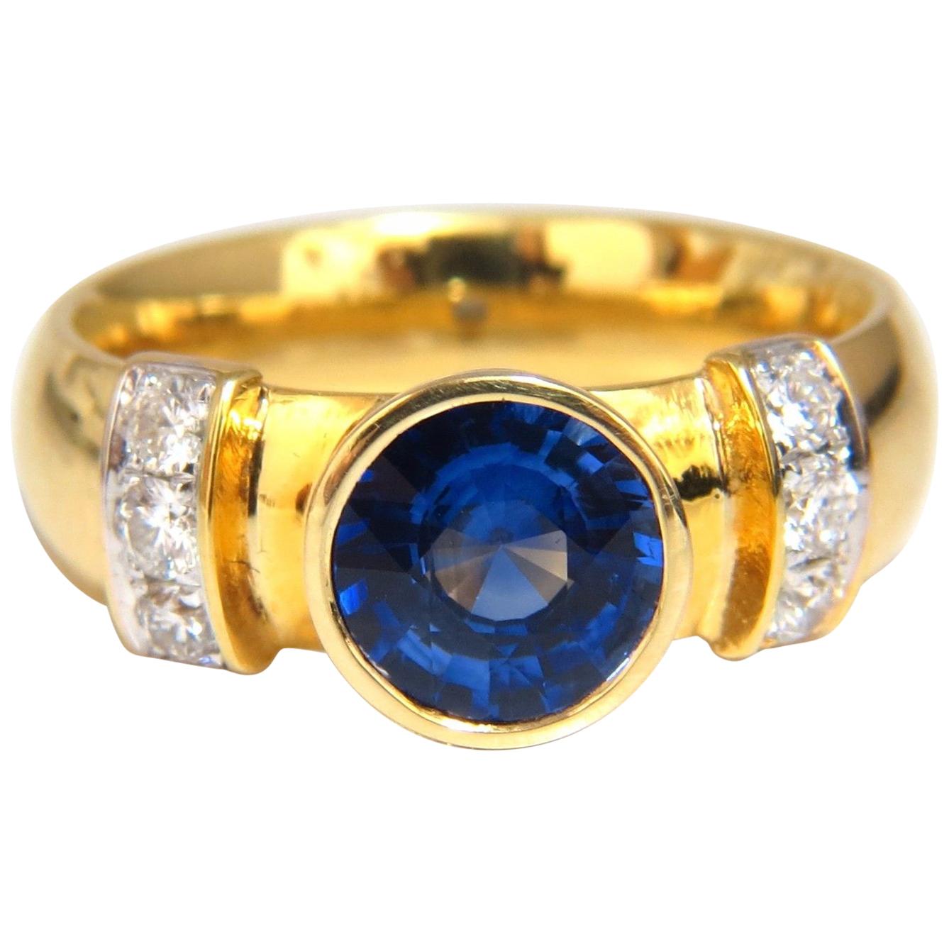 1.50ct natural vivid blue round saphhire diamonds ring 14kt Benchmark Comfort* (saphir rond bleu vif naturel)