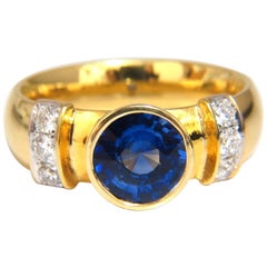 1.50ct natural vivid blue round saphhire diamonds ring 14kt Benchmark Comfort* (saphir rond bleu vif naturel)