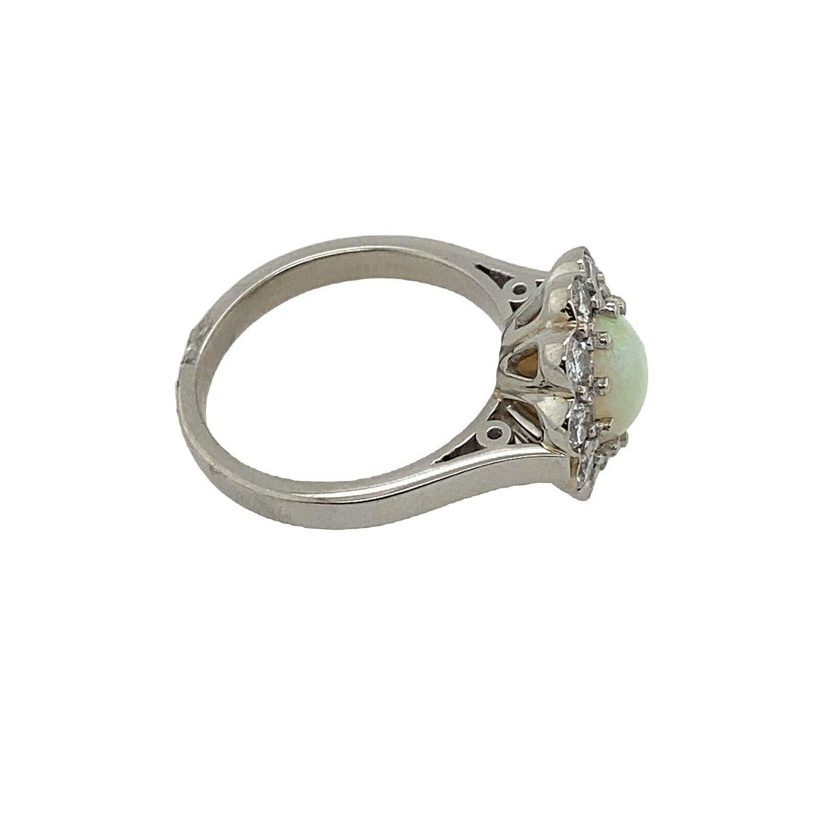 1.50ct Opal and 0.75ct Natural Diamonds Cluster Ring, Set Platinum
This gorgeous Opal and Diamond ring is a classic piece of jewellery. The centre stone is a 1.5ct Opal surrounded by 0.75ct natural Diamonds. This Opal and Diamond ring is a beautiful