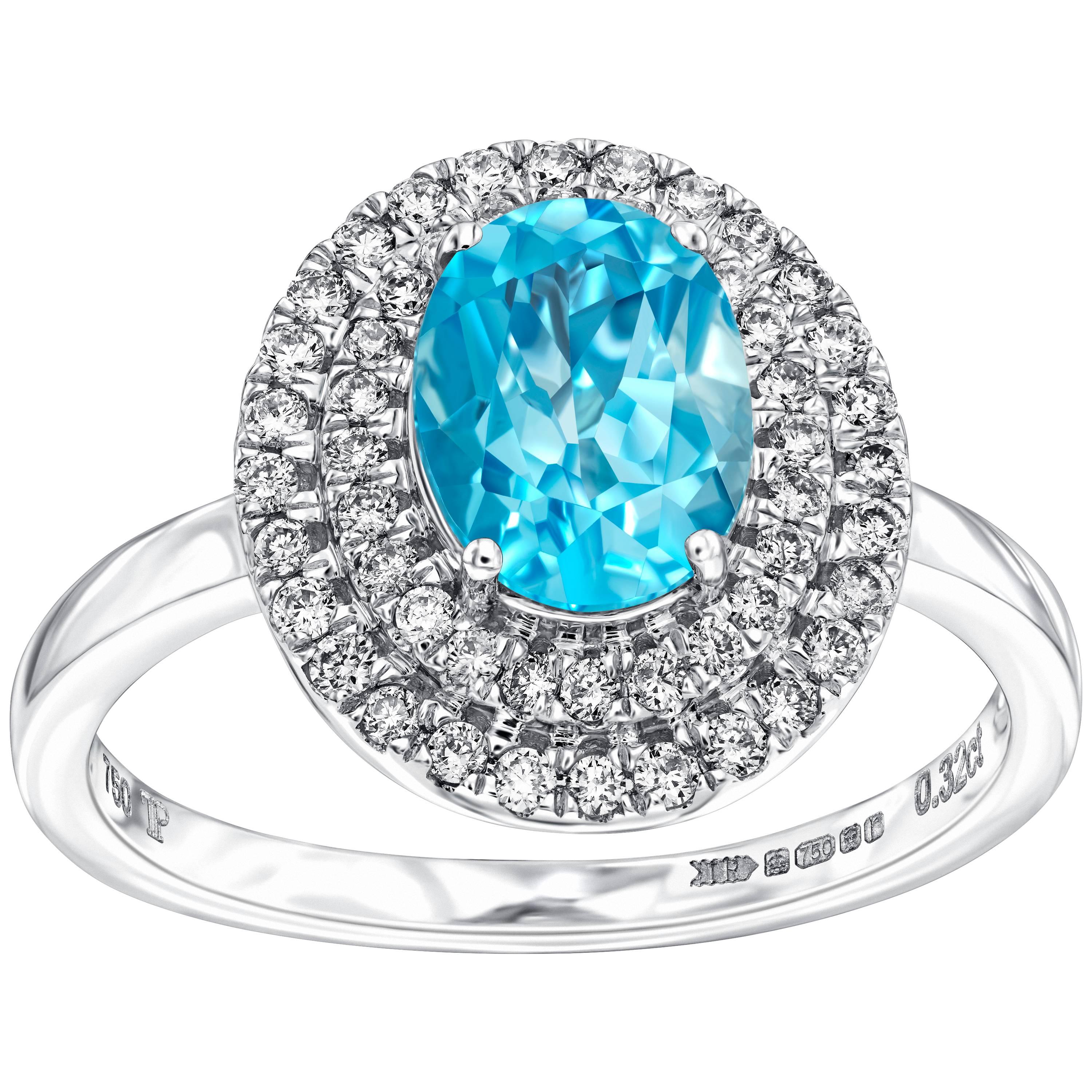 Modern 2.02 Carat Oval Blue Topaz Diamond Halo 18 KT White Gold Engagement Ring For Sale