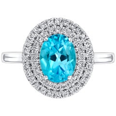 2.02 Carat Oval Blue Topaz Diamond Halo 18 KT White Gold Engagement Ring