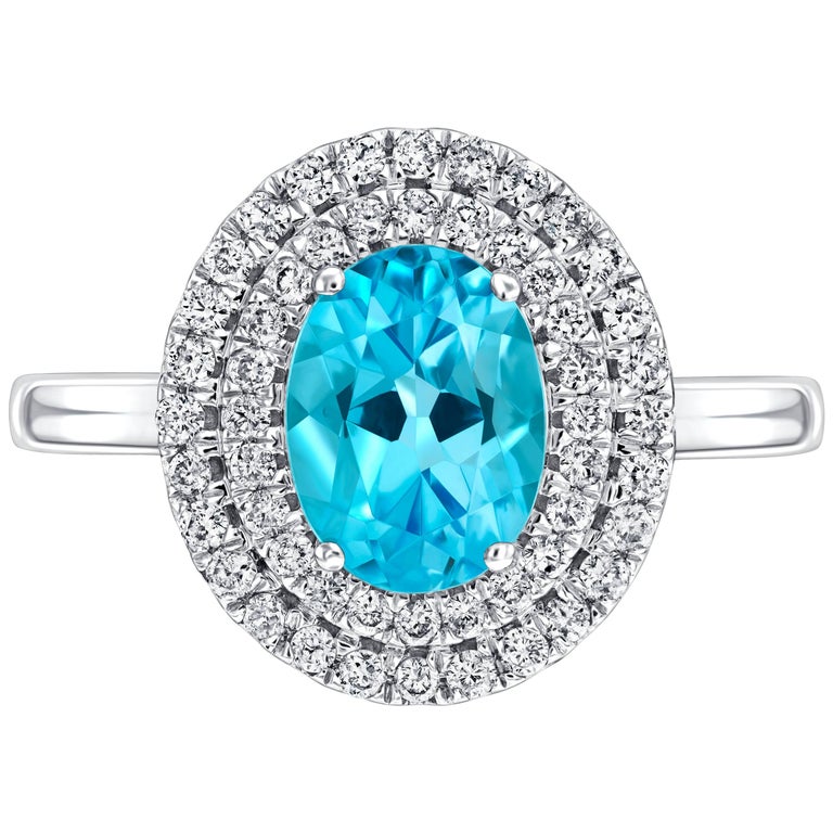 2.02 Carat Oval Blue Topaz Diamond Halo 18 KT White Gold Engagement