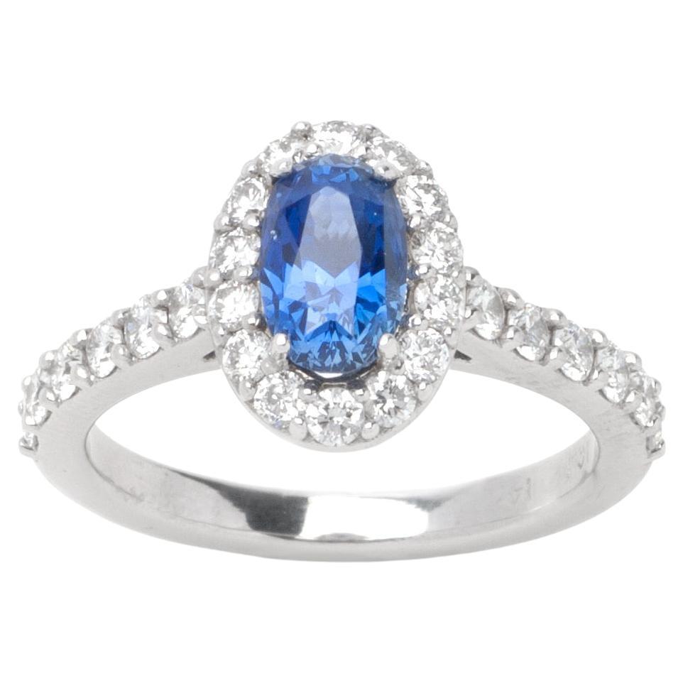 1.50ct Oval Sapphire Ring in 14K White Gold; 0.90ct Side Diamonds For Sale