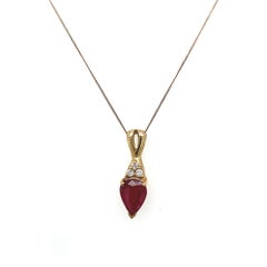 1.50ct Pear Shape Ruby with 3 Round Brilliant Cut Diamonds on 16/18'' Chain