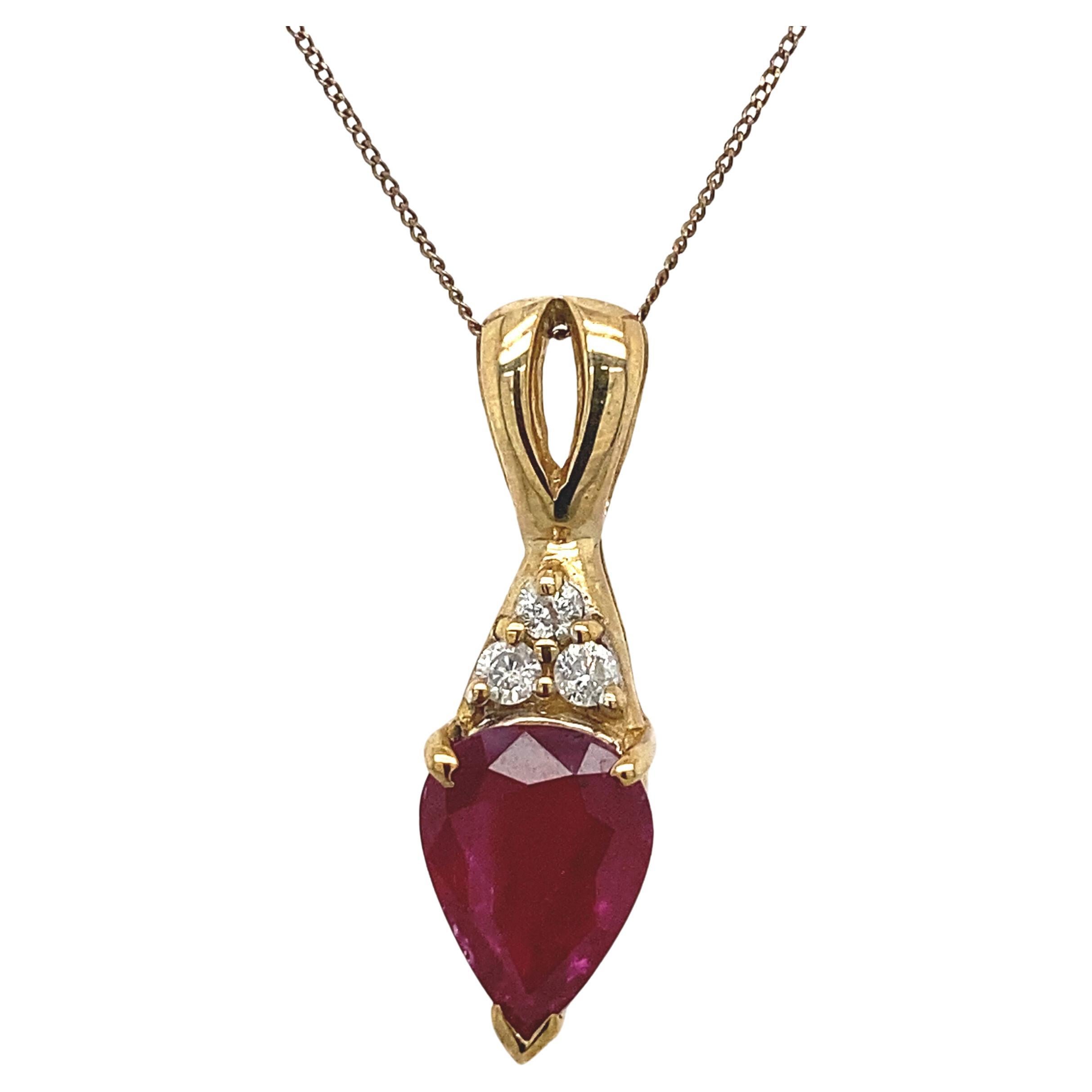1.50ct Pear Shape Ruby with 3 Round Brilliant Cut Diamonds on 16/18'' Chain For Sale