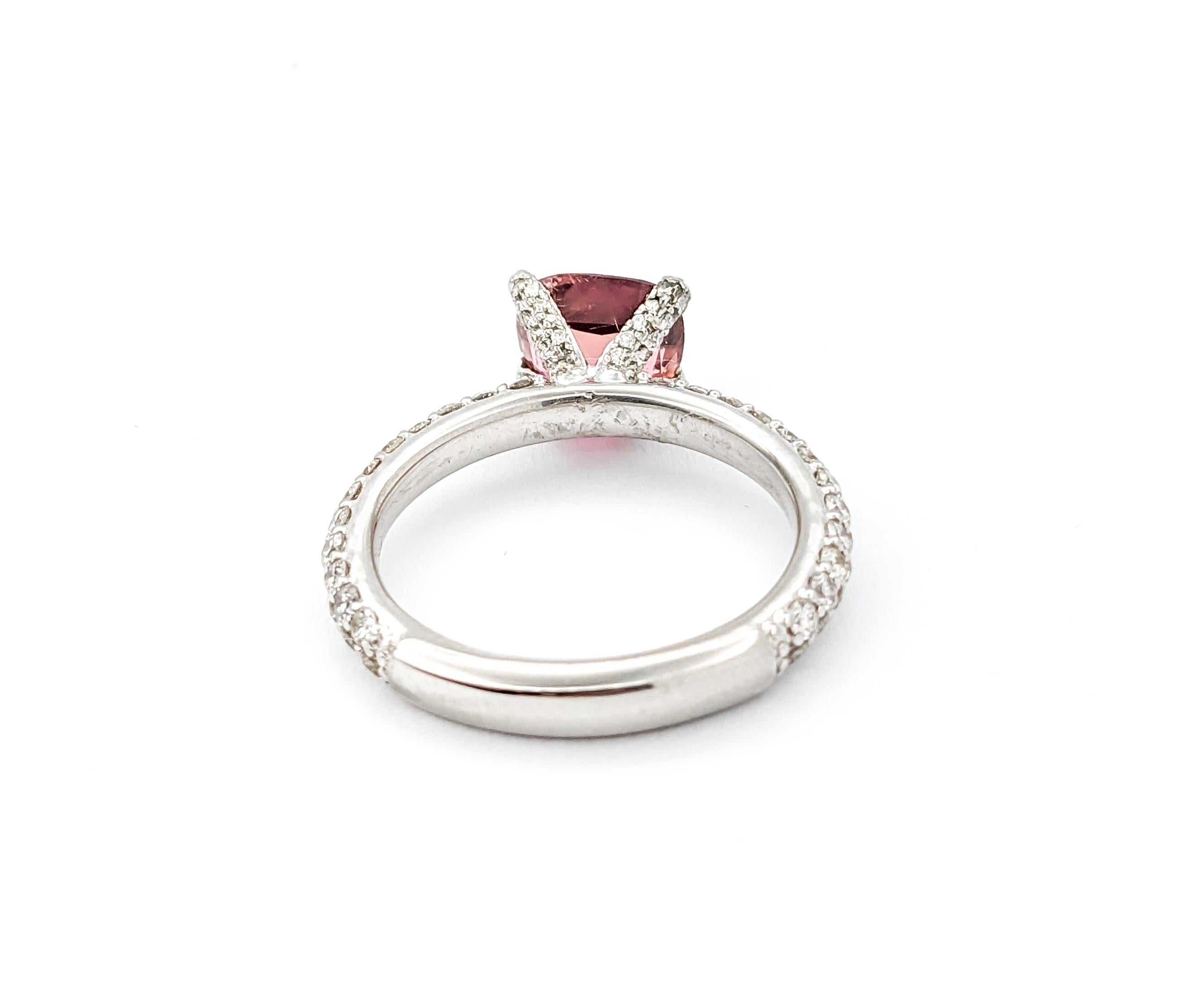 1.50ct Pink Tourmaline  & Diamond Ring In Platinum

Introducing this exquisite Pink Tourmaline ring, masterfully crafted in bright 950 platinum. This ring celebrates a captivating 1.50ct pink tourmaline at its heart. Further enhancing the showy pink