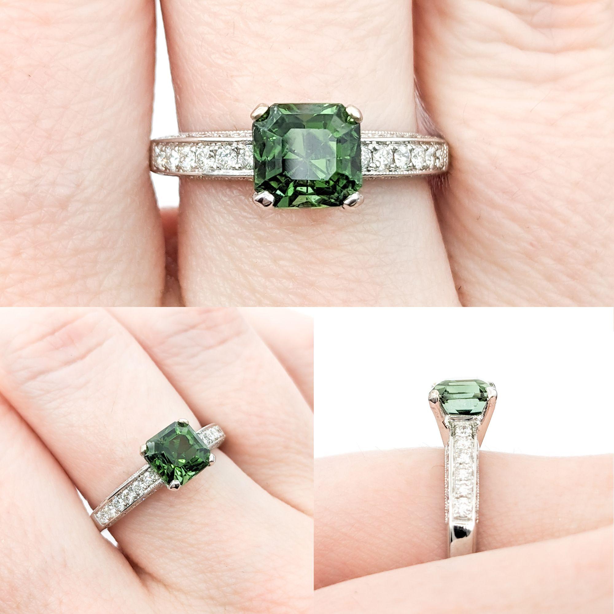 1.50ct Tourmaline & .60ctw Diamond Ring In White Gold

Introducing a stunning ring crafted in 14kt white gold. This exquisite piece features a 1.50ct green tourmaline centerpiece, complemented by .60ctw of round diamonds. The sparkling diamonds