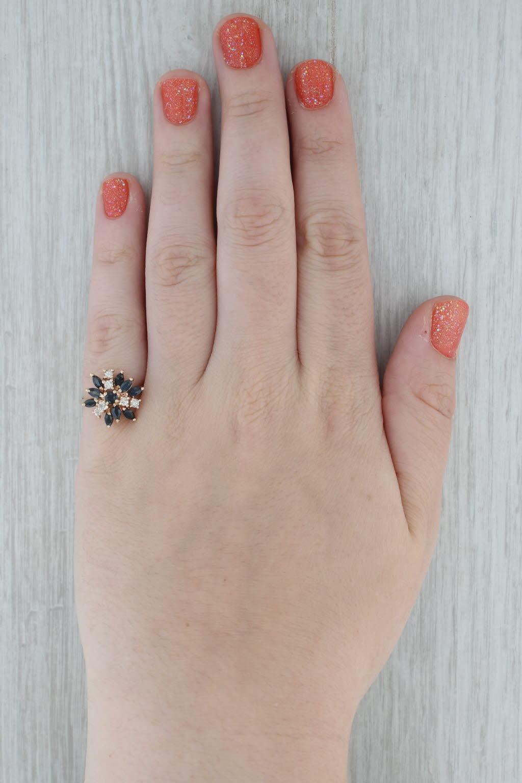 Gemstone Information:
- Natural Sapphires -
Total Carats - 1.20ctw
Cut - Marquise
Color - Dark Blue
Treatment - Heated

- Natural Diamonds -
Total Carats - 0.30ctw
Cut - Round Brilliant
Color - H - I
Clarity - SI2 - I1

Metal: 14k Yellow