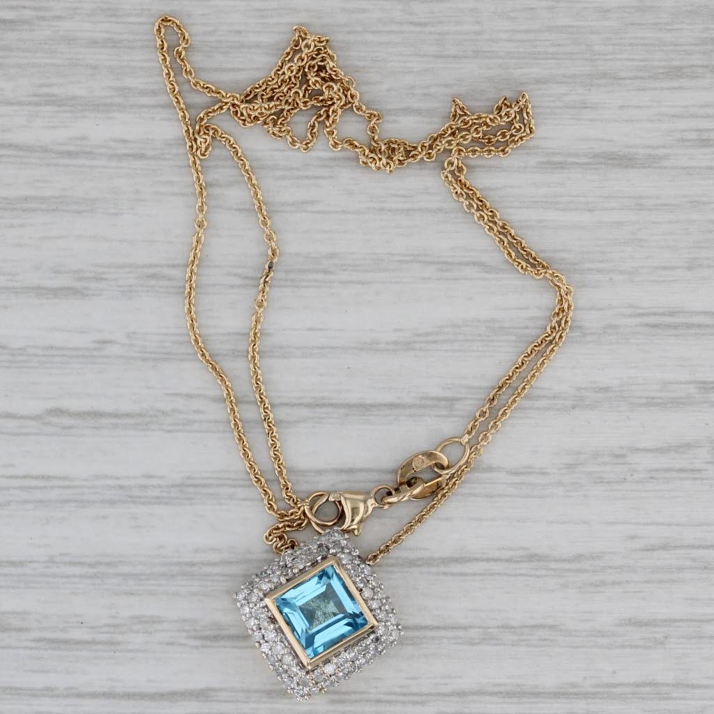Gemstone Information:
- Natural Topaz -
Carats - 1.20ct
Cut - Square
Color - Light Blue
Treatment - Routinely Enhanced

- Natural Diamonds -
Total Carats - 0.30ctw
Cut - Single
Color - I - J
Clarity - I1 - I2

Metal: 14k Yellow Gold
Weight: 3.8