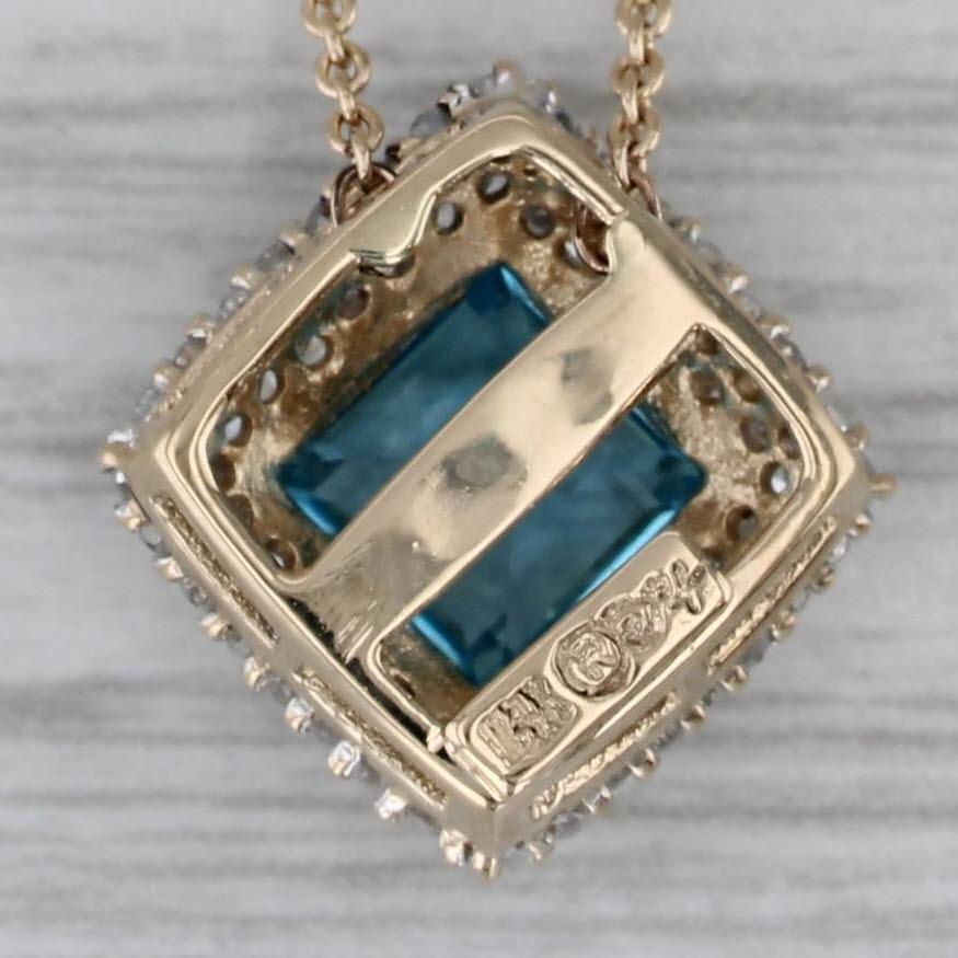 1.50ctw Blue Topaz Diamond Halo Pendant Necklace 14k Yellow Gold 16