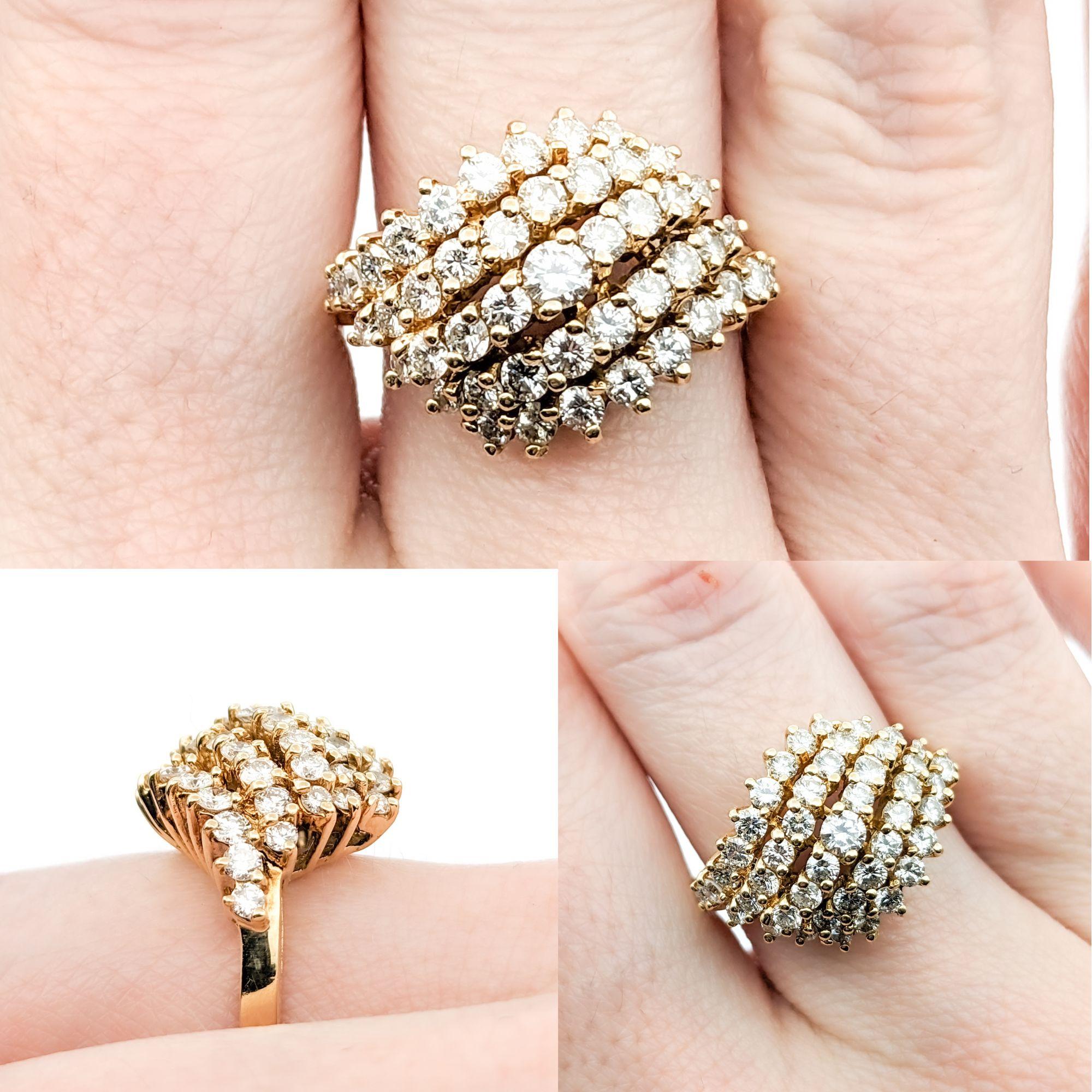 1.50ctw Diamond Waterfall Cluster Ring In Yelllow Gold

This magnificent ring, elegantly crafted in 14kt yellow gold, dazzles with an impressive array of diamonds totaling 1.50 carats, arranged in a breathtaking waterfall cluster that cascades