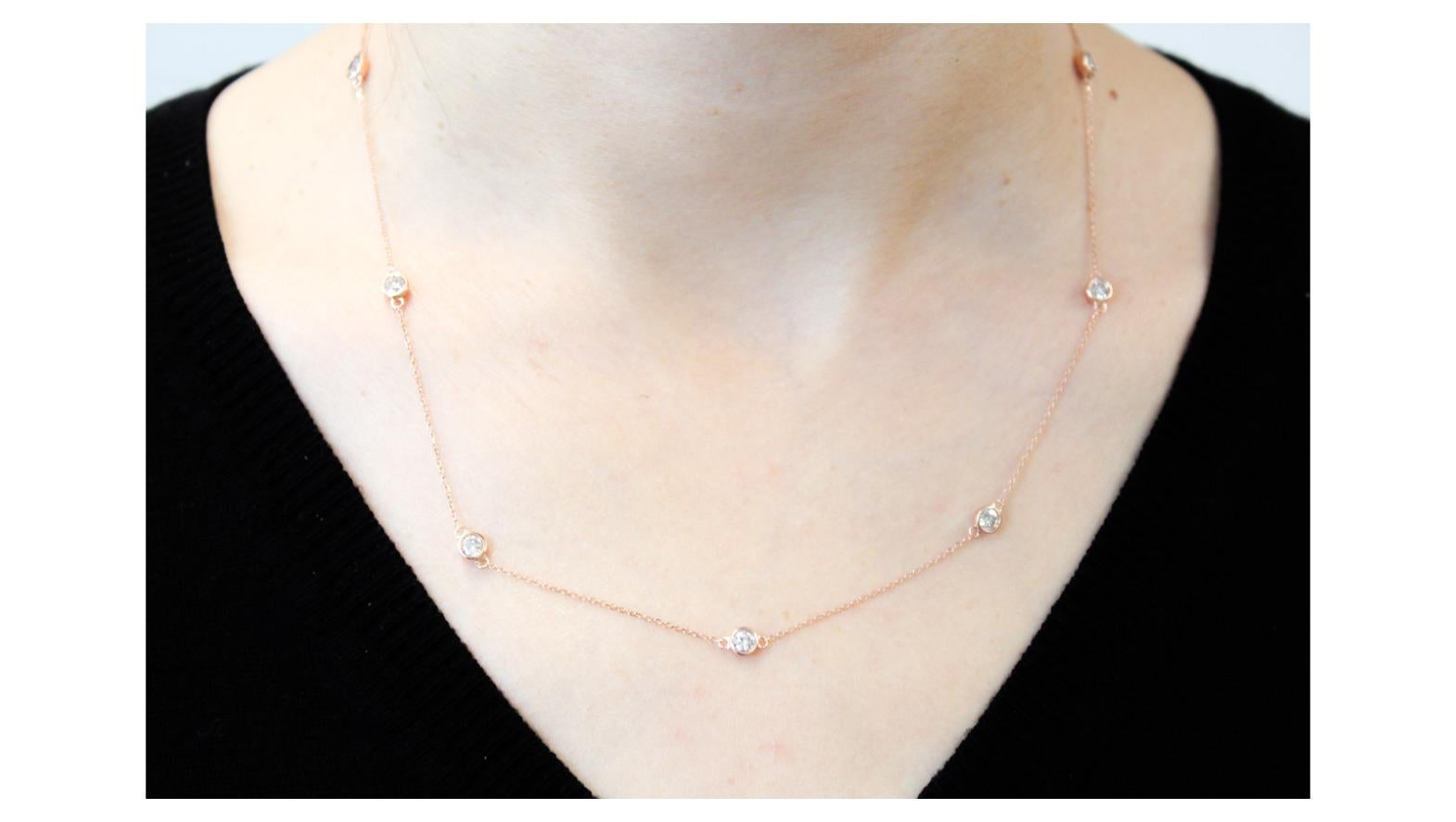 A gorgeous diamond necklace will rarely go overlooked. This 18” piece is both rare and stunning. It includes bezels that set white round diamonds. There are 10 white diamonds that total 1.50 and are I-J color and I1/I2 clarity. This versatile
