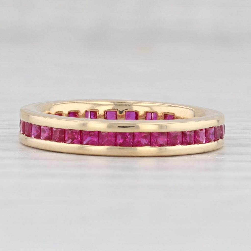 Gemstone Information:
- Natural Rubies -
Total Carats - 1.50ctw
Cut - Square
Color - Red
Treatment - Routinely Enhanced 

Metal: 18k Yellow Gold 
Weight: 5 Grams 
Stamps: 18k
Face Height: 3.5 mm 
Rise Above Finger: 2.5 mm
Band / Shank Width: 3.5