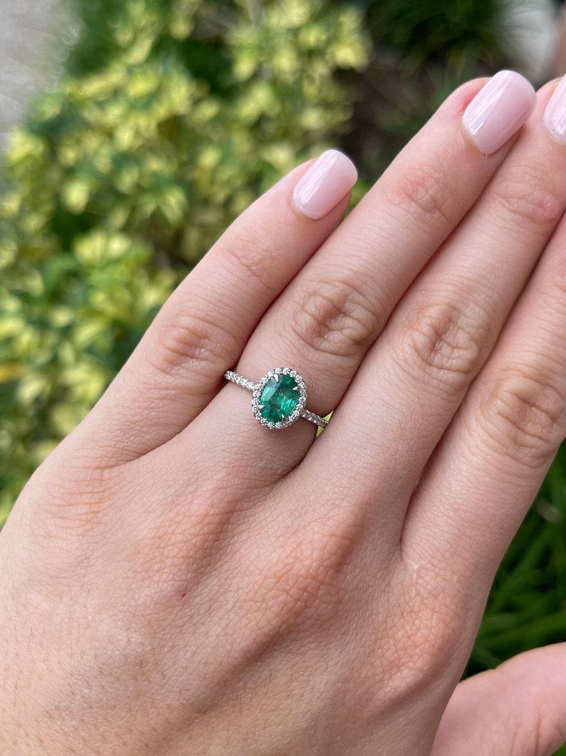 Women's 1.50tcw 14K Natural Oval Emerald & Diamond Halo Engagement Ring For Sale