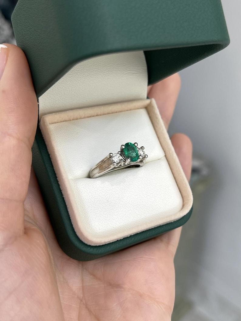 Modern 1.50tcw 14K Oval Emerald & Diamond Three-Stone Ring - Lush Green 585 White Gold For Sale