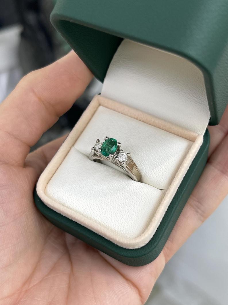 Oval Cut 1.50tcw 14K Oval Emerald & Diamond Three-Stone Ring - Lush Green 585 White Gold For Sale