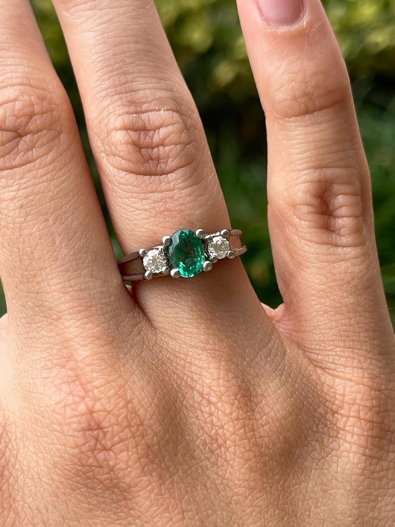 Women's 1.50tcw 14K Oval Emerald & Diamond Three-Stone Ring - Lush Green 585 White Gold For Sale