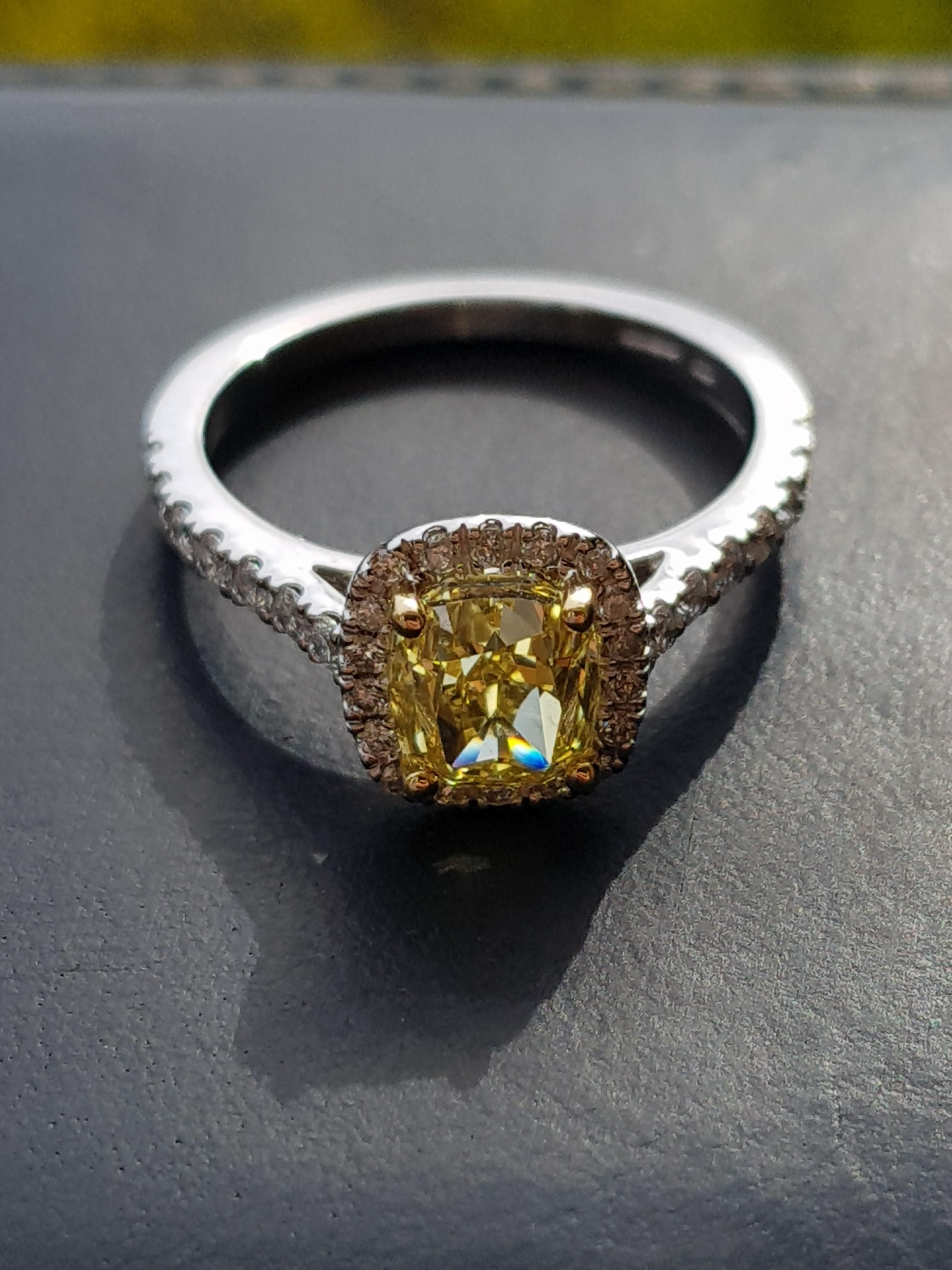 1.51 Carat Cushion Cut Fancy Intense Yellow Diamond Halo Engagement Ring In New Condition For Sale In London, GB