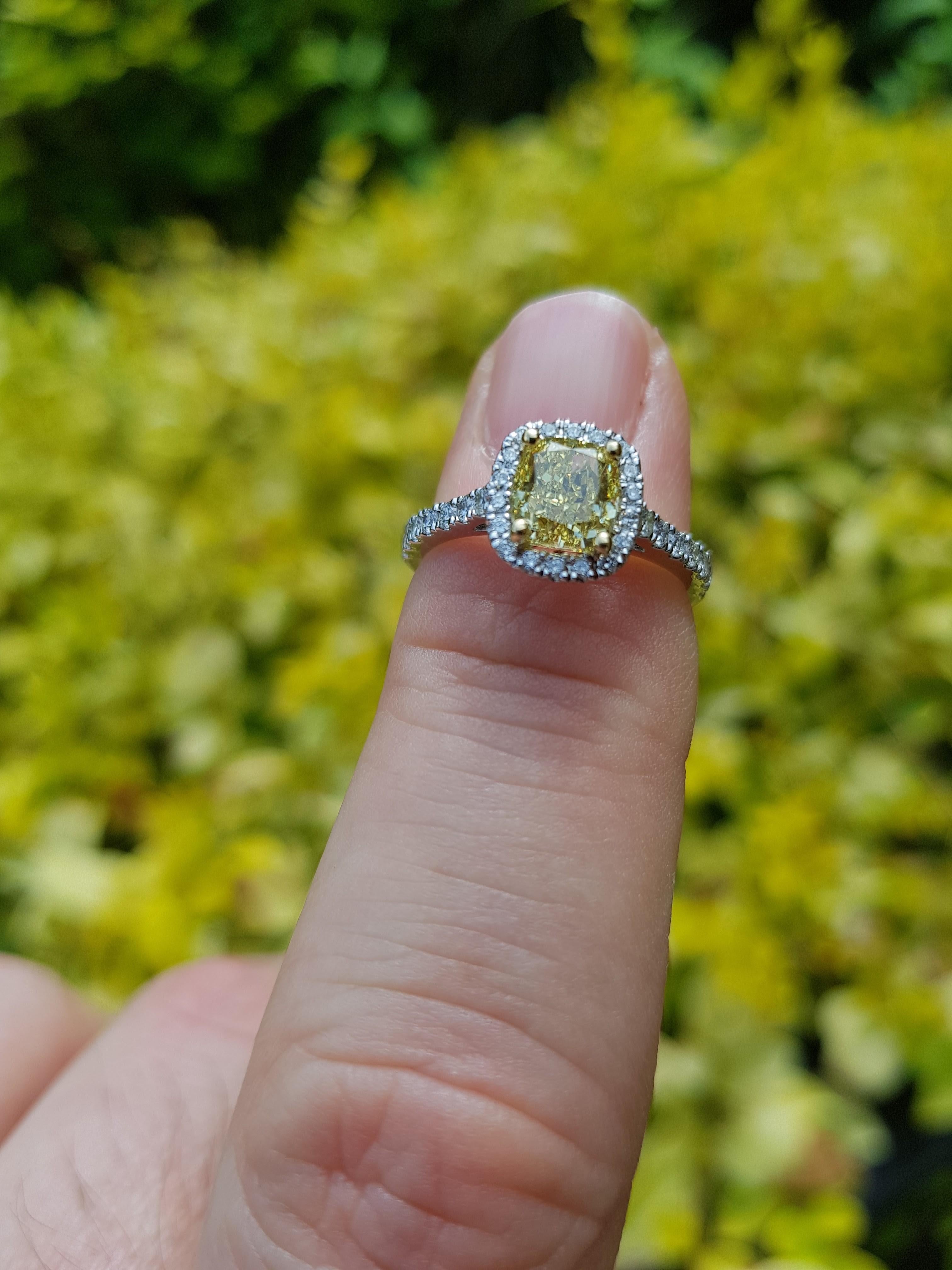 Women's 1.51 Carat Cushion Cut Fancy Intense Yellow Diamond Halo Engagement Ring For Sale