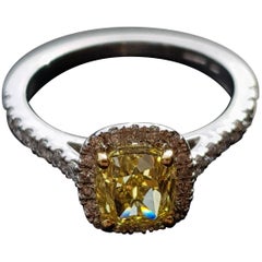 1.51 Carat Cushion Cut Fancy Intense Yellow Diamond Halo Engagement Ring