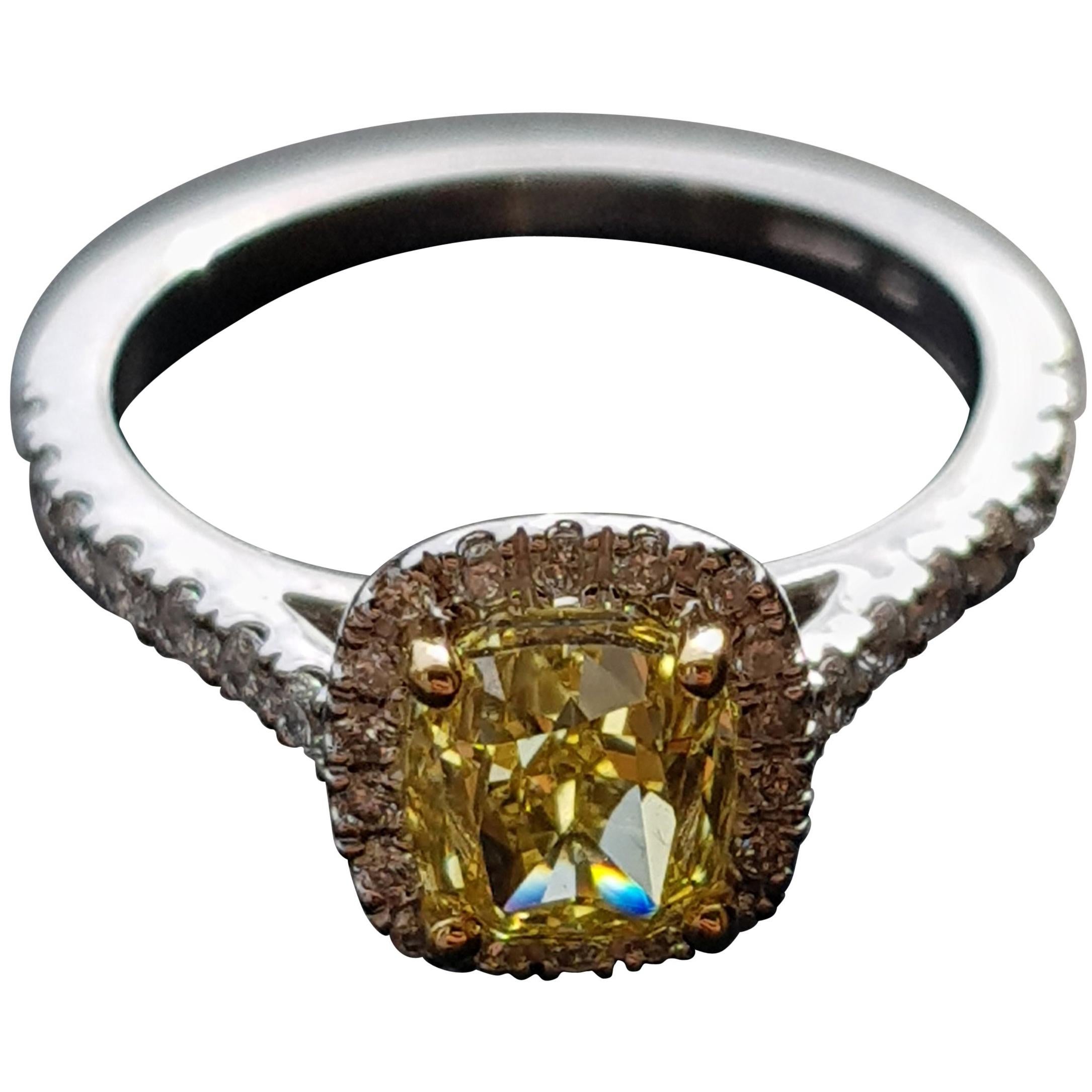 1.51 Carat Cushion Cut Fancy Intense Yellow Diamond Halo Engagement Ring For Sale