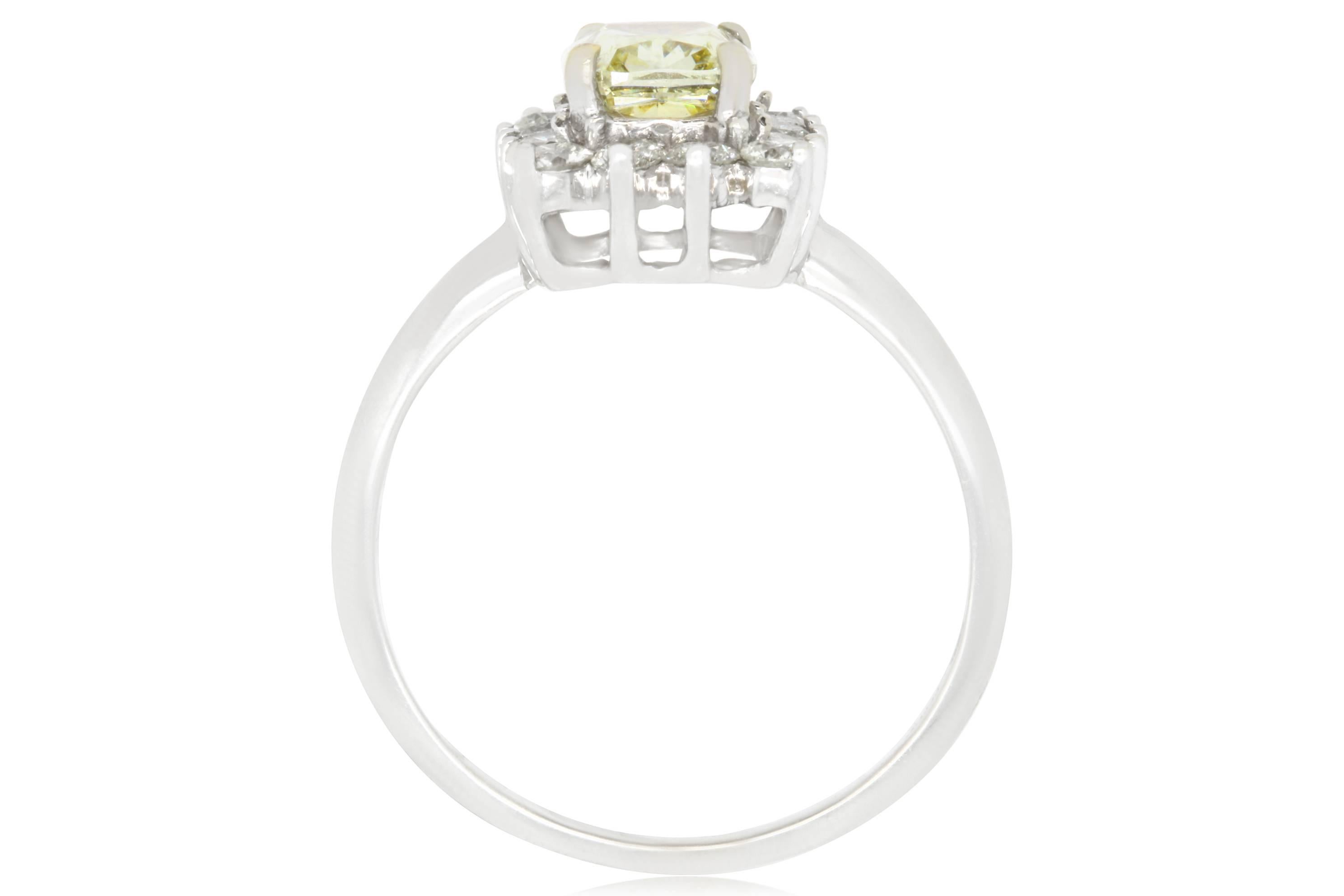 Material: 18K White Gold 
Center Stone Details: 1 Cushion Cut Yellow Diamond at 1.51 Carats 
Stone Details: 14 Round White Diamonds at 0.63 Carats. Clarity: VS-SI  / Color: H-I
Ring Size: Size 7.25 (can be sized)

Fine one-of-a kind craftsmanship