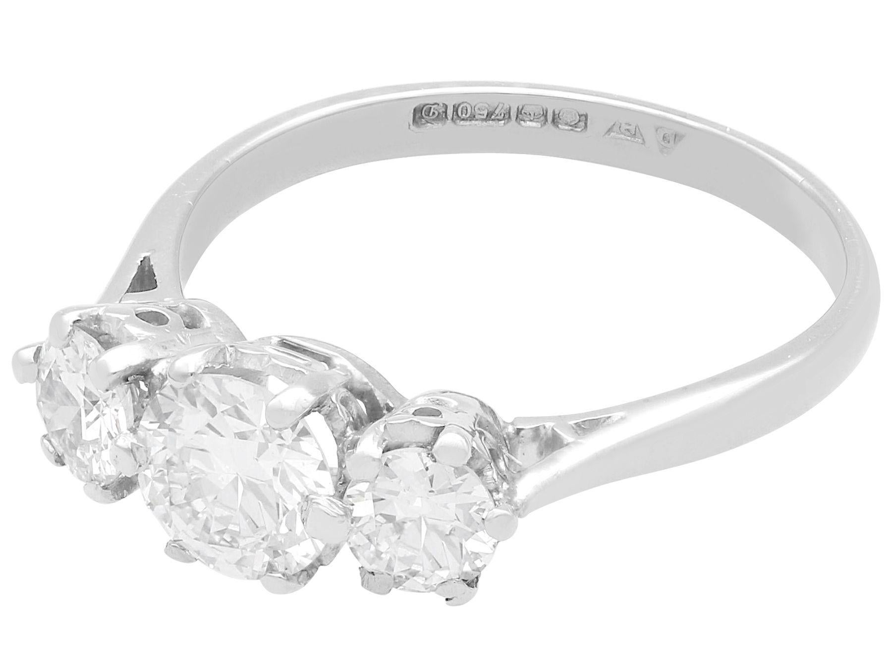 Round Cut 1.51 Carat Diamond and White Gold Trilogy Engagement Ring For Sale