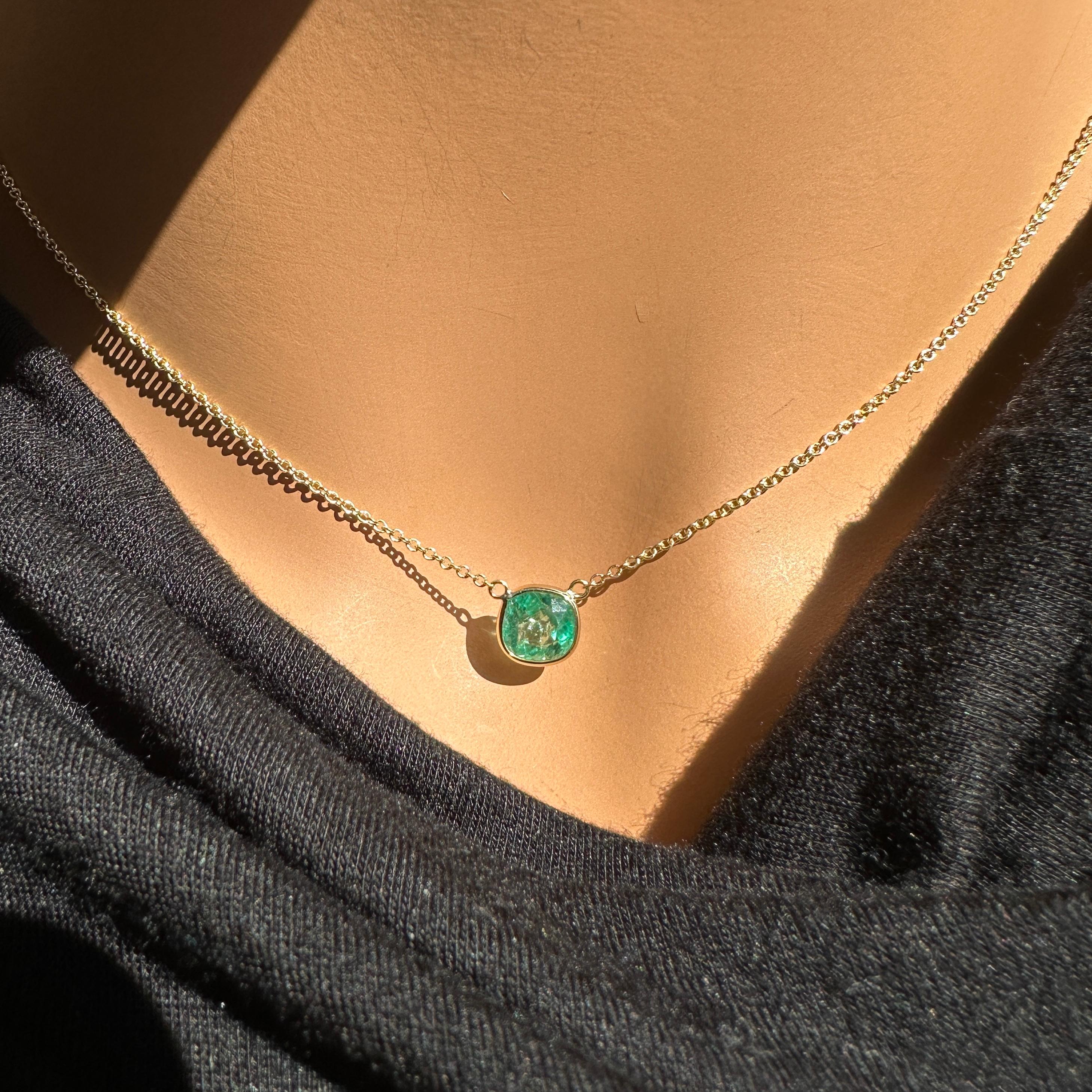 A fashion necklace crafted in 14k yellow gold with a main stone of a cushion-cut emerald weighing 1.51 carats would be a beautiful and stylish choice. Emeralds are known for their lush green color and timeless appeal, and the cushion cut adds a