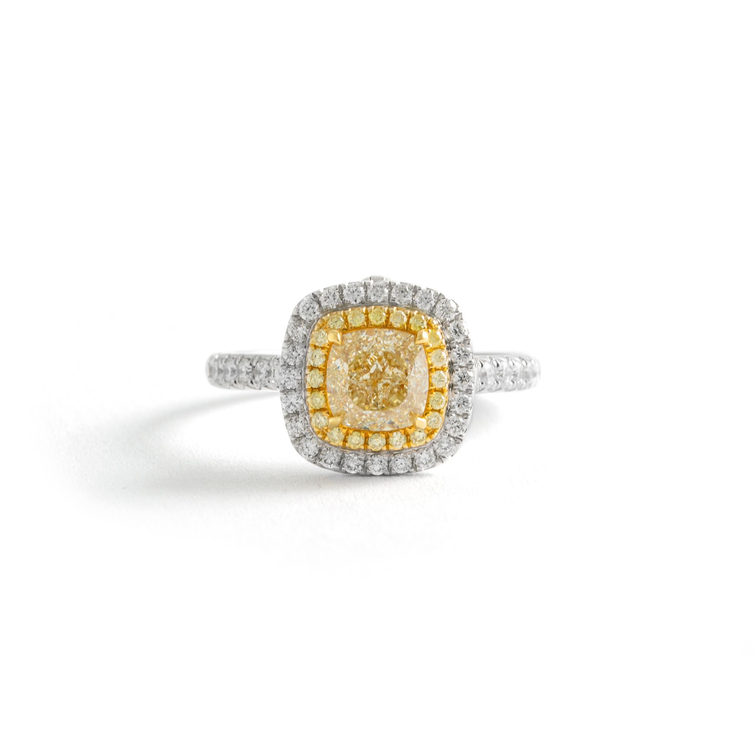 1.51 carat Fancy Light Brownish Yellow Cushion No Fluorescence GIA report on 18K white and yellow gold ring.
20 Natural Yellow Diamonds round cut 0.10 carat VS clarity. 39 White Diamonds 0.45 carat VS clarity and G color.

