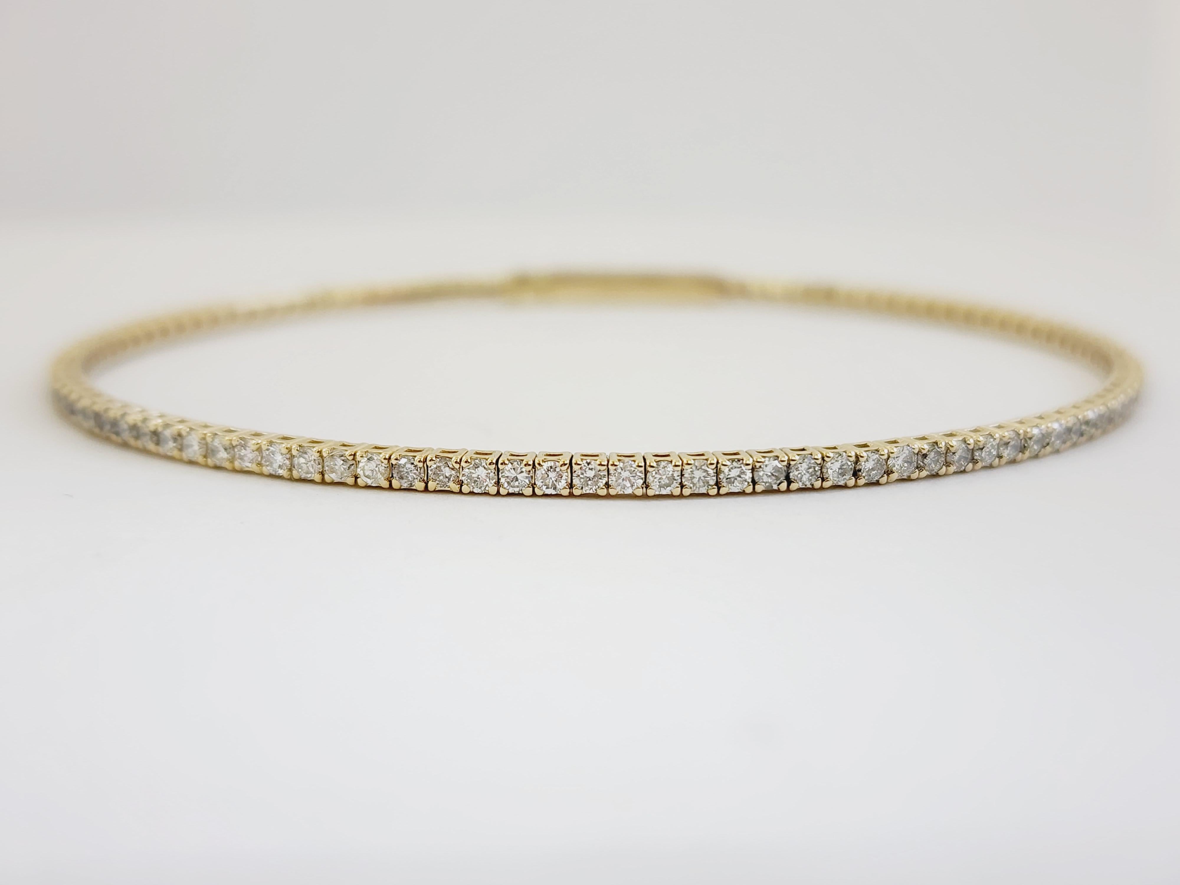 Natural Diamonds 1.51 ctw flexible bangle yellow gold 14k 7 Inch. Average Color H Clarity VS . 1.8 mm wide.