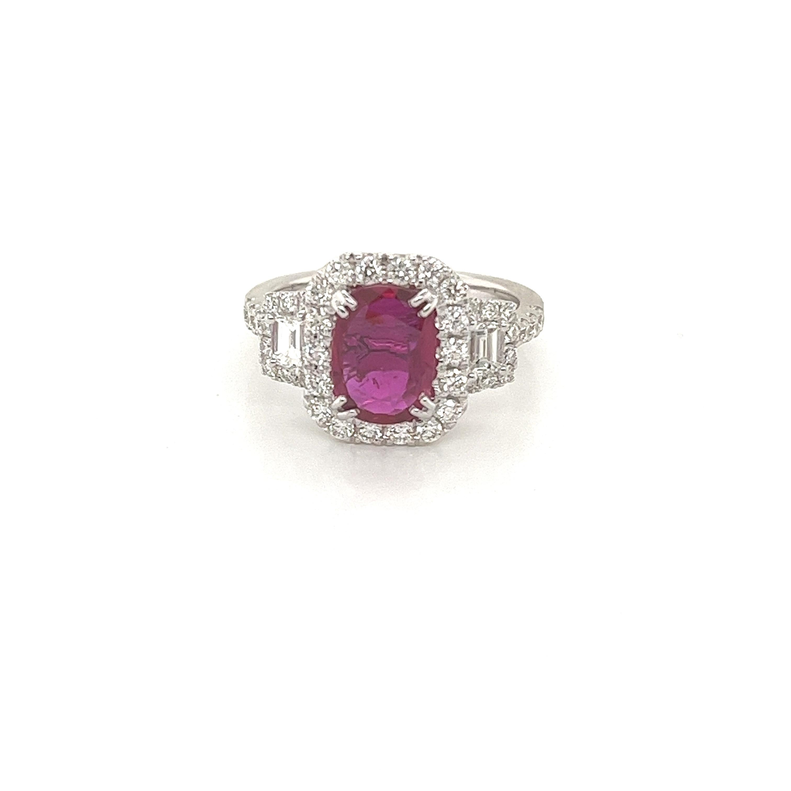 GIA certified unheated ruby weighing 1.51 cts
Measuring (9.01x6.62x2.43) mm
Two baguette diamonds weighing .21 cts
42 round diamonds weighing .63 cts
Set in 18 karat white gold ring
4.28 grams