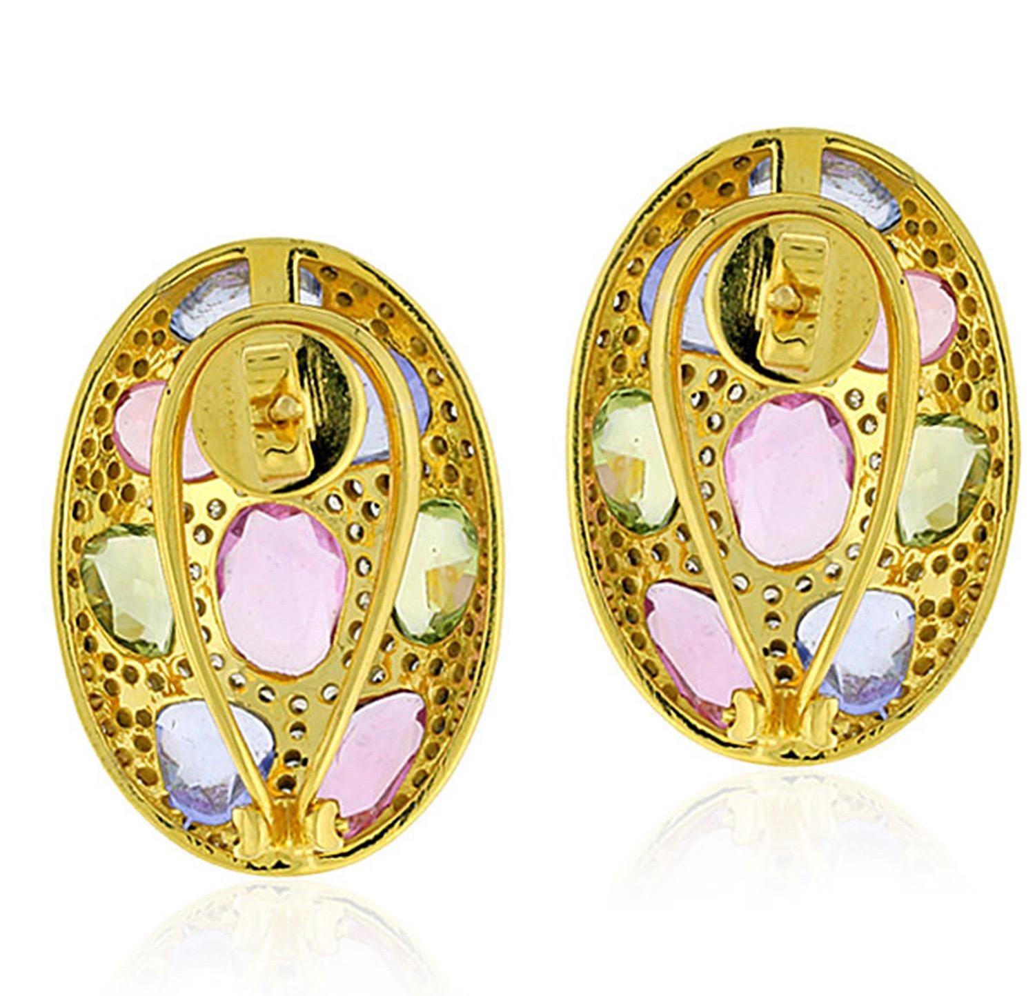 Cast from 14 karat gold, these stunning multi sapphire earrings are hand set with 1.79 carats of diamonds and 15.1 carats multi color sapphires with blackened finish.

FOLLOW  MEGHNA JEWELS storefront to view the latest collection & exclusive