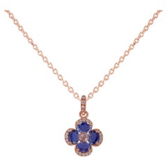 1.51 Carat Oval Cut Blue Sapphire Pendant Necklace in 18 Karat Gold with Diamond