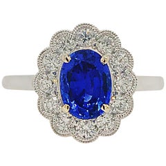 1.51 Carat Oval Sapphire and Diamond Ring with Milgrain Detail