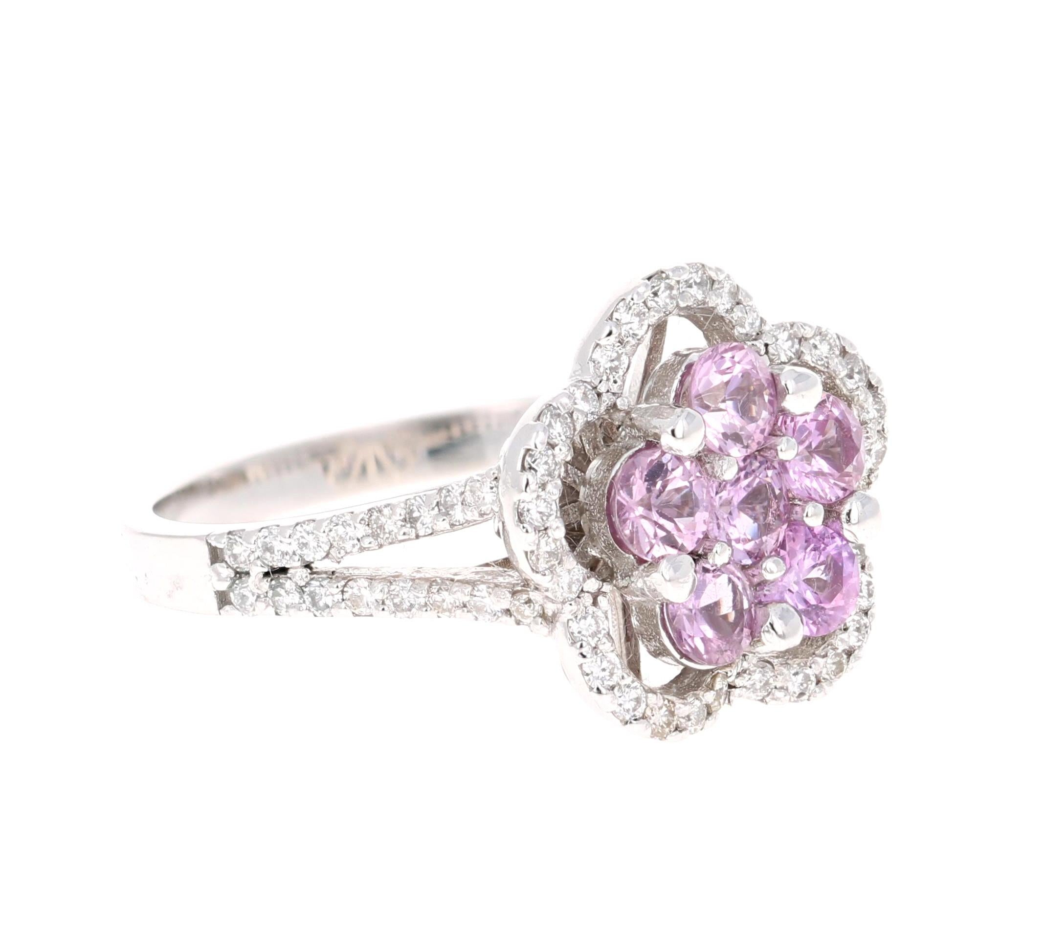 Cute Pink Sapphire and Diamond Ring! Can be an everyday ring or a unique Promise Ring!

This beautiful ring has 6 Round Cut Pink Sapphires that weigh 1.06 Carats as well as 62 Round Cut Diamonds that weigh 0.45 Carats. The total carat weight of the