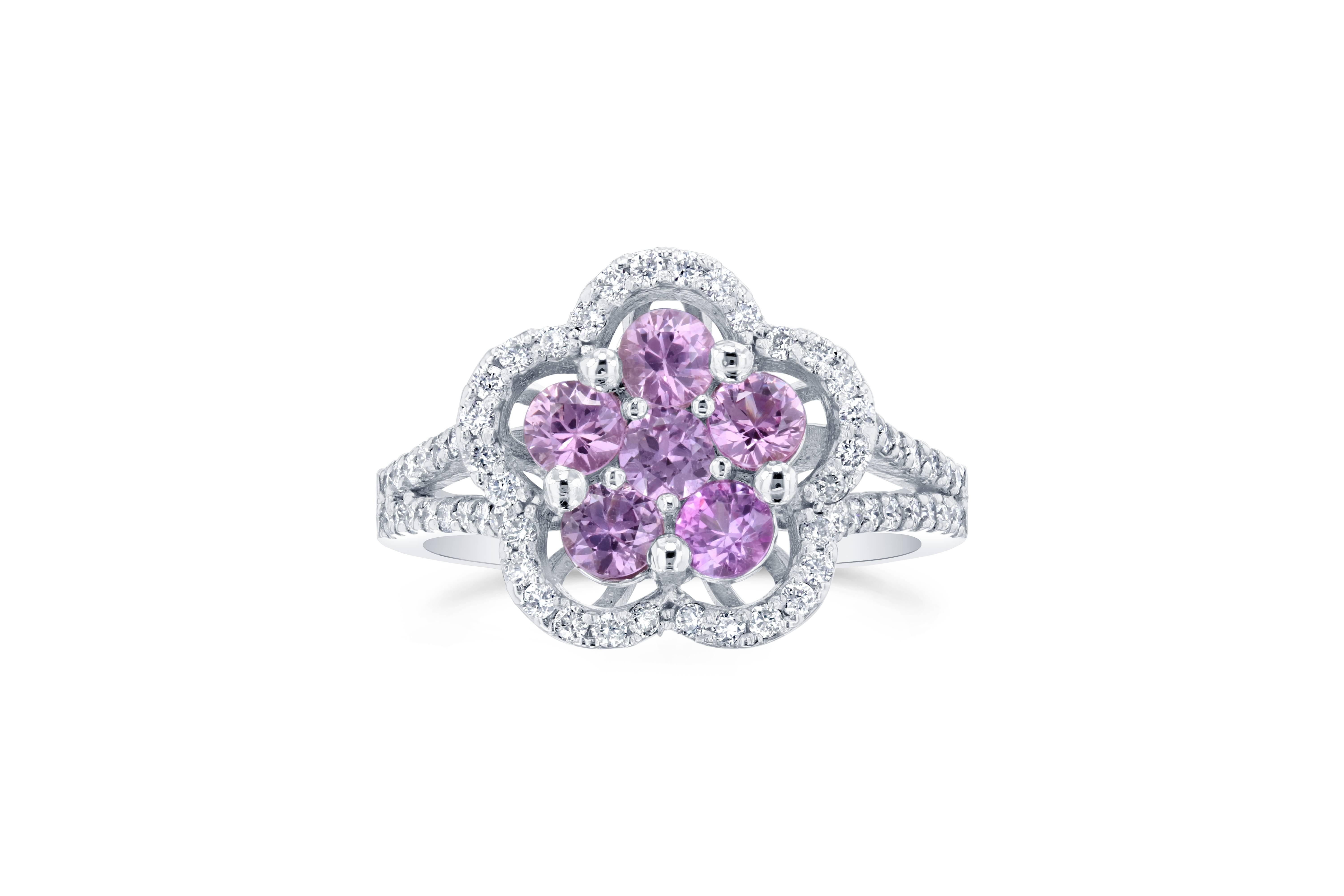 This ring has 6 Pink Sapphires in the center of the ring that weigh a total of 1.06 carats and is surrounded by 62 Round Brilliant Cut Diamonds that weigh a total of 0.45 carat. The total carat weight of the ring is 1.51 carats.

The ring is casted