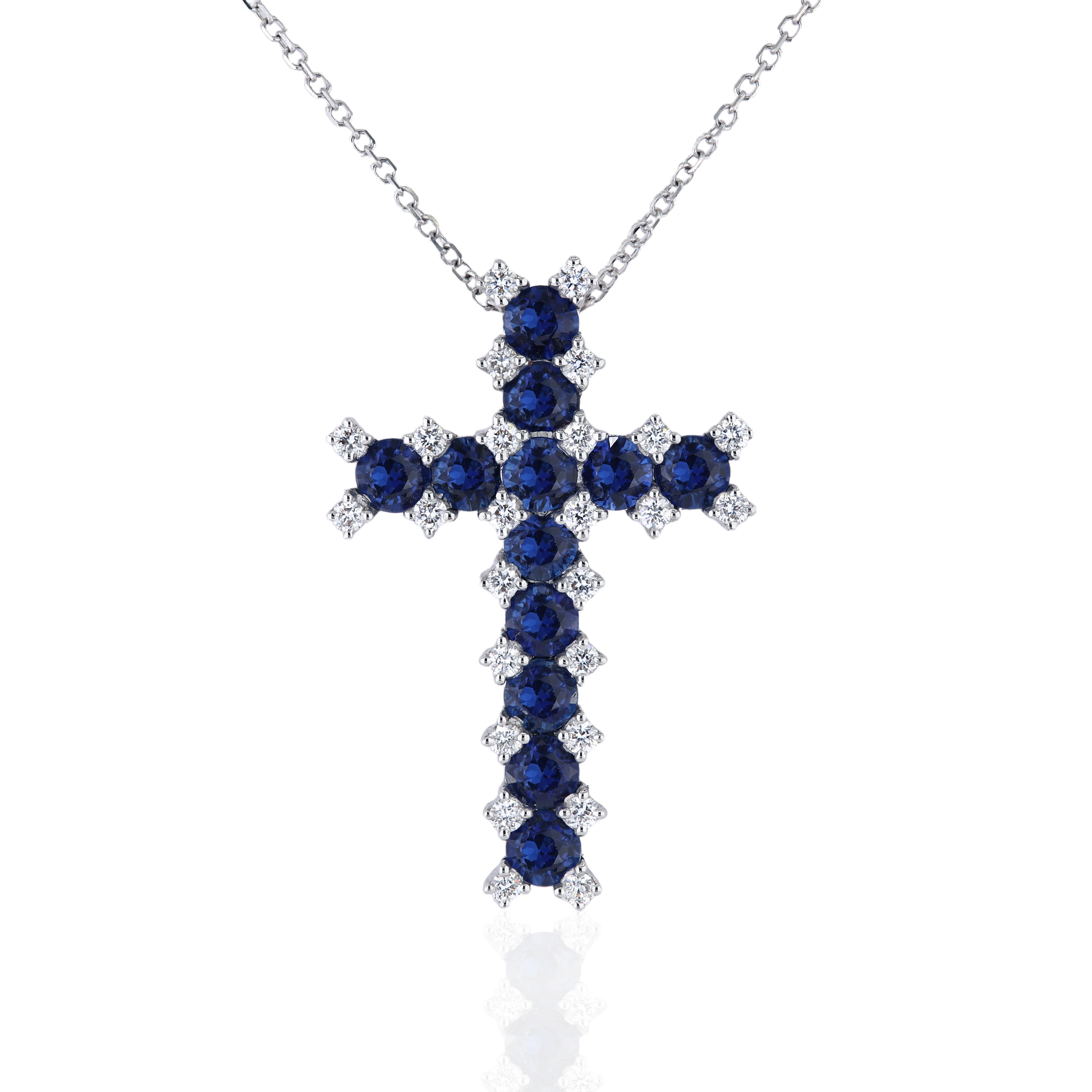 Contemporary 1.51 Carat Round Blue Sapphire and 0.26 Ct Round Natural Diamond Cross Pendant For Sale