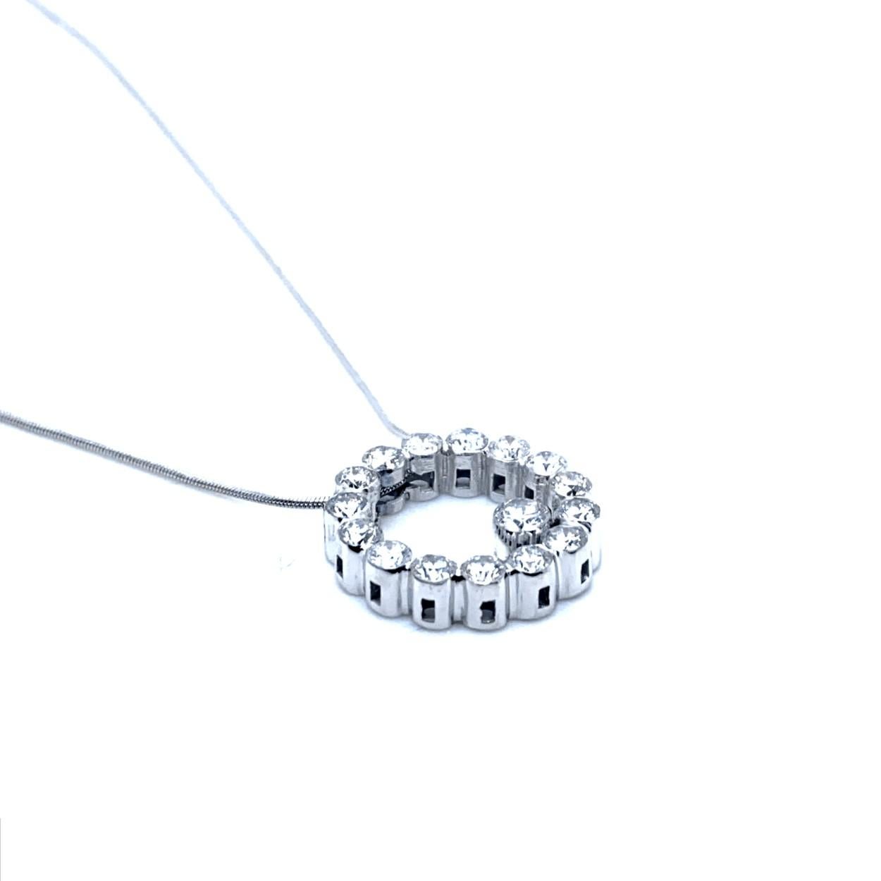 18K Gold Beautiful Circle of Life Pendant with 15 2.75 mm Round Diamonds on the circle and 1 3.5 mm Round Diamond on the bottom with total weight of 1.51 Ct Invisible Set Diamond necklace with 16