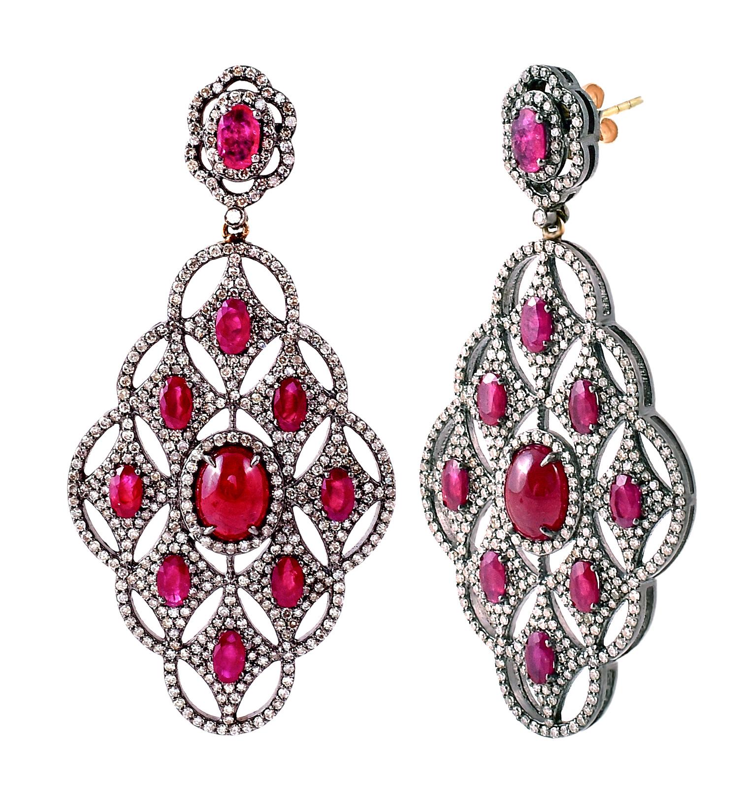 15.10 Carat Ruby and Diamond Cocktail Dangle Earrings in Art-Deco Style

This Victorian style impressive scarlet red ruby and diamond hanging earring is exceptional. The bottom overall kite shape formed with the beautiful designer element of 9