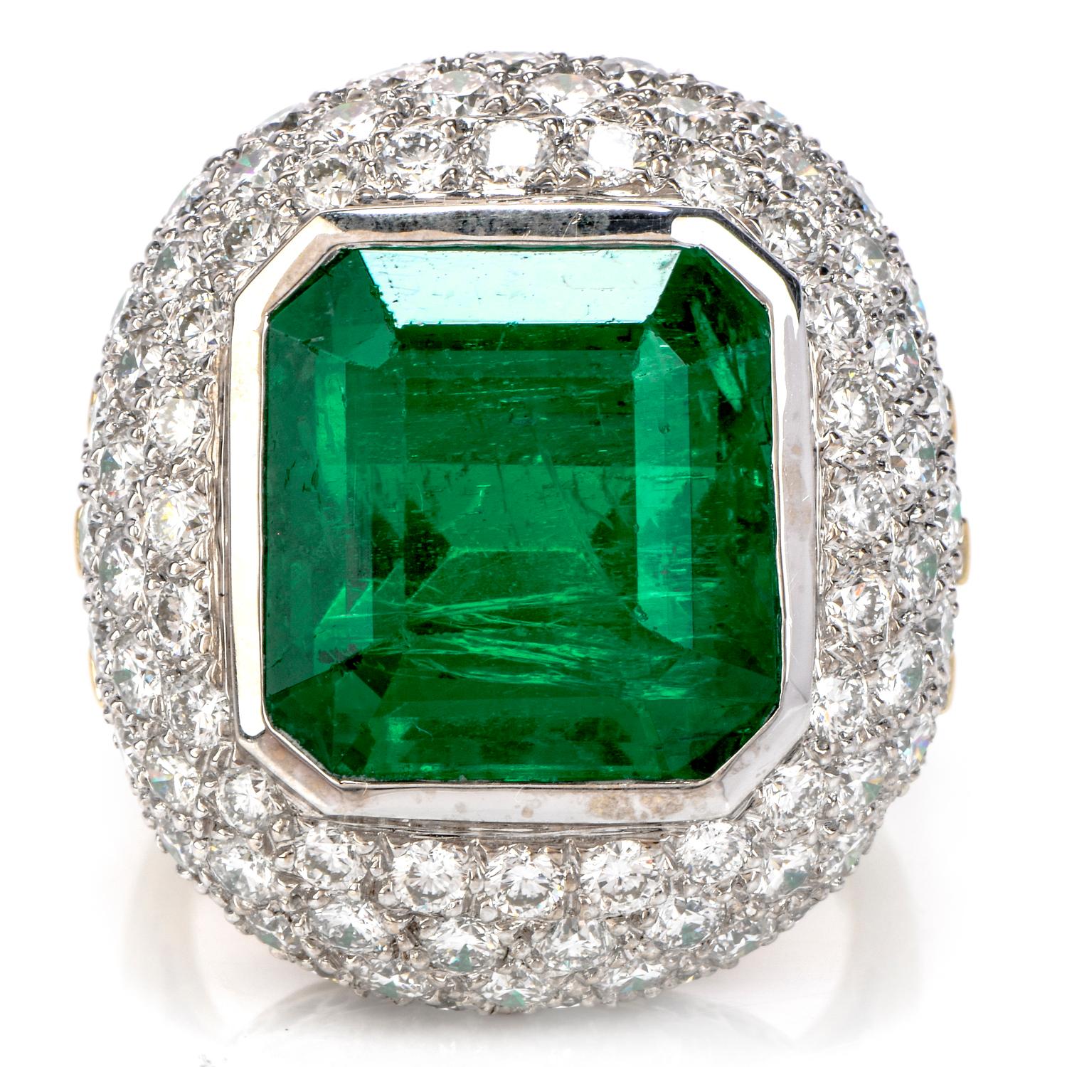 Treat yourself to this irresistibly stunning Estate Diamond Zambian Emerald 18K Gold Large Cocktail Ring!  This ring is crafted in 18 karat yellow gold and white gold.  The center gemstone is one square emerald cut, bezel set, genuine deep green