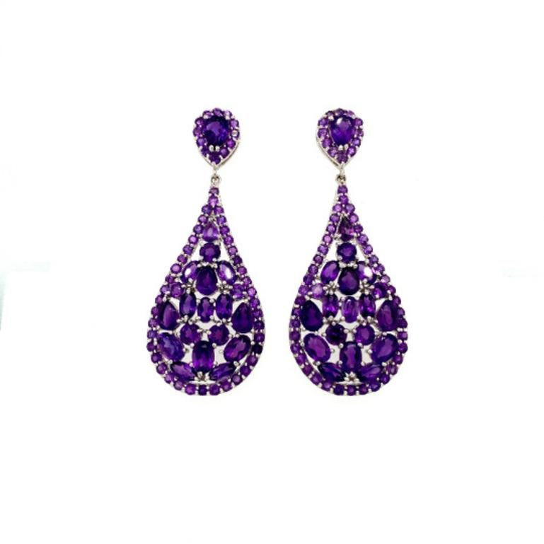 These gorgeous Statement Amethyst Cluster Dangle Drop Wedding Earrings are crafted from the finest material and adorned with dazzling amethyst gemstone which encourages clear thinking and alleviates worries and fears. 
These dangle earrings are