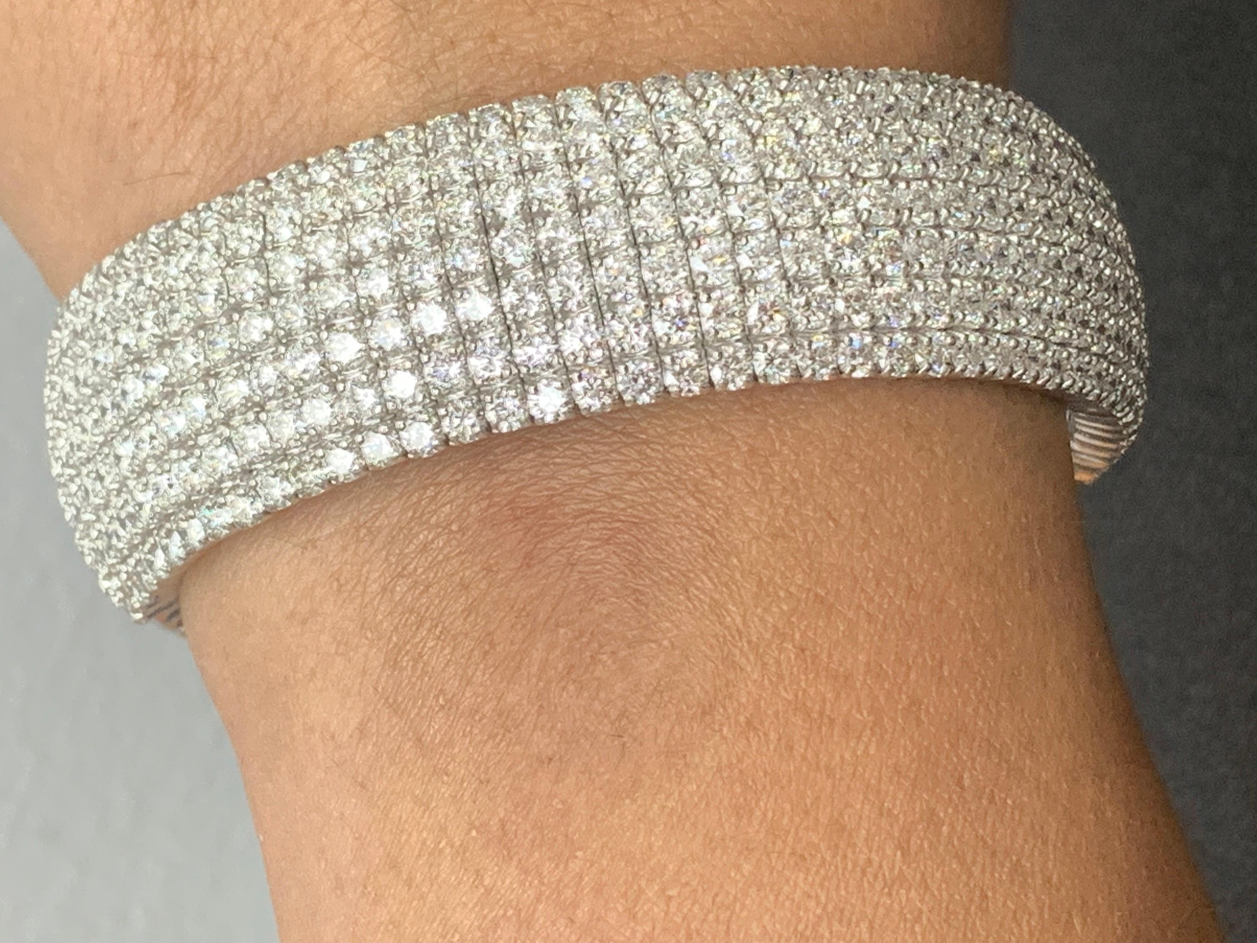 Breathtaking 14K White Gold Bracelet in a unique Cuff-Style with 7 Rows of 287 Brilliant Cut Round Diamonds totaling 15.11 carats. 

All diamonds are GH color SI1 Clarity.
Available in Yellow and White Gold. 
Style is available in different price