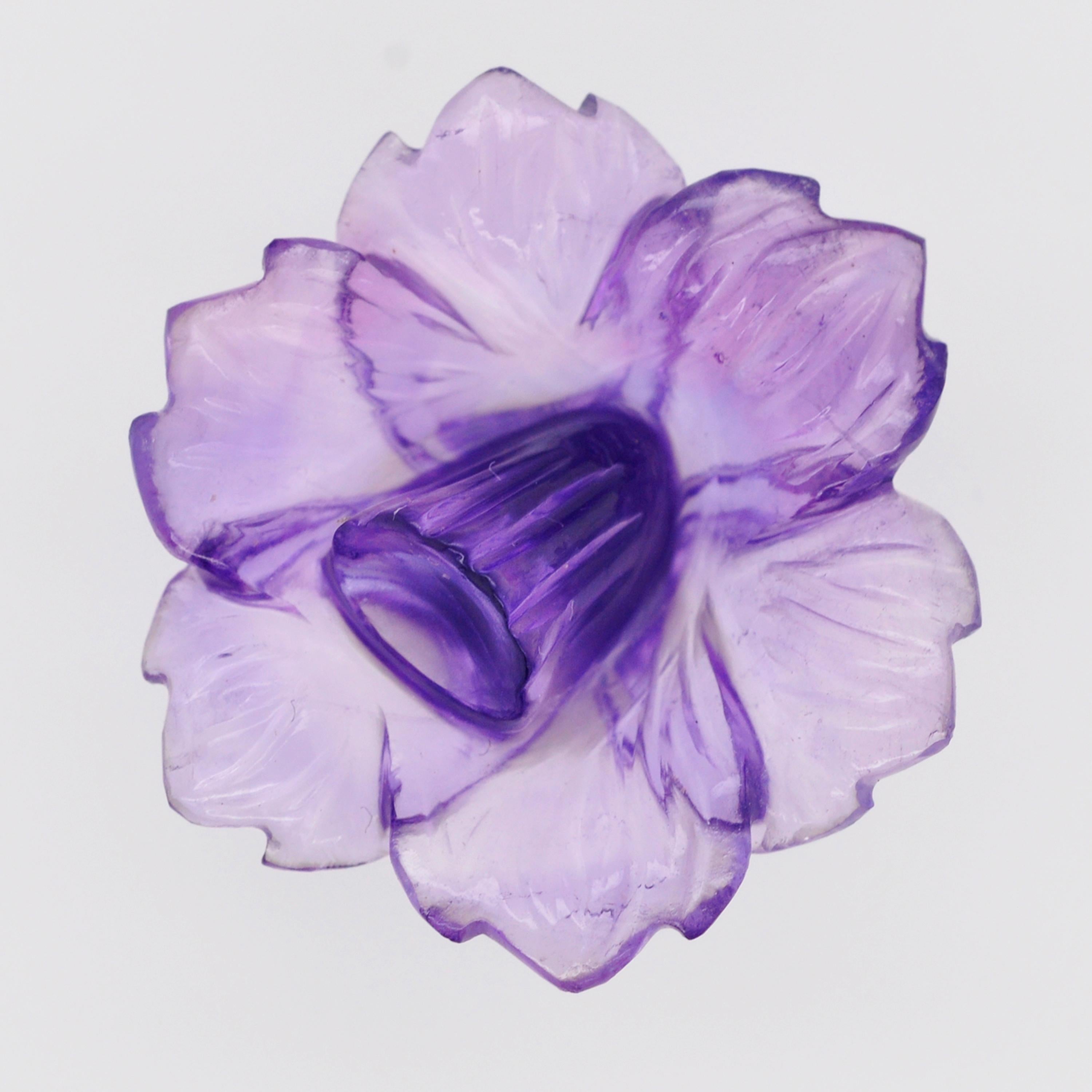Our hand-carved 15.13 carat African Amethyst Daffodil Flower Loose Gemstone is a breathtaking work of art meticulously crafted by our expert lapidary artist in Jaipur. With exceptional skill and attention to detail, the lapidary artist has