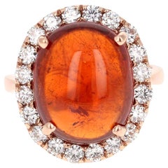 Bague cocktail en or rose avec grenat spessartine de 15,14 carats et diamants