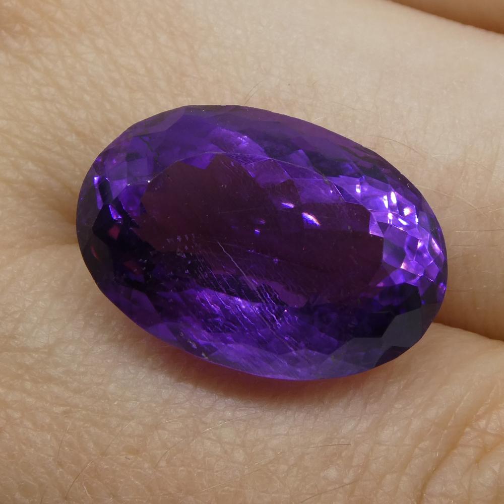 Description:

Gem Type: Amethyst
Number of Stones: 1
Weight: 15.18 cts
Measurements: 18.65x12.80x10.30 mm
Shape: Oval
Cutting Style Crown: Modified Brilliant
Cutting Style Pavilion: Modified Brilliant
Transparency: Transparent
Clarity: Very Slightly