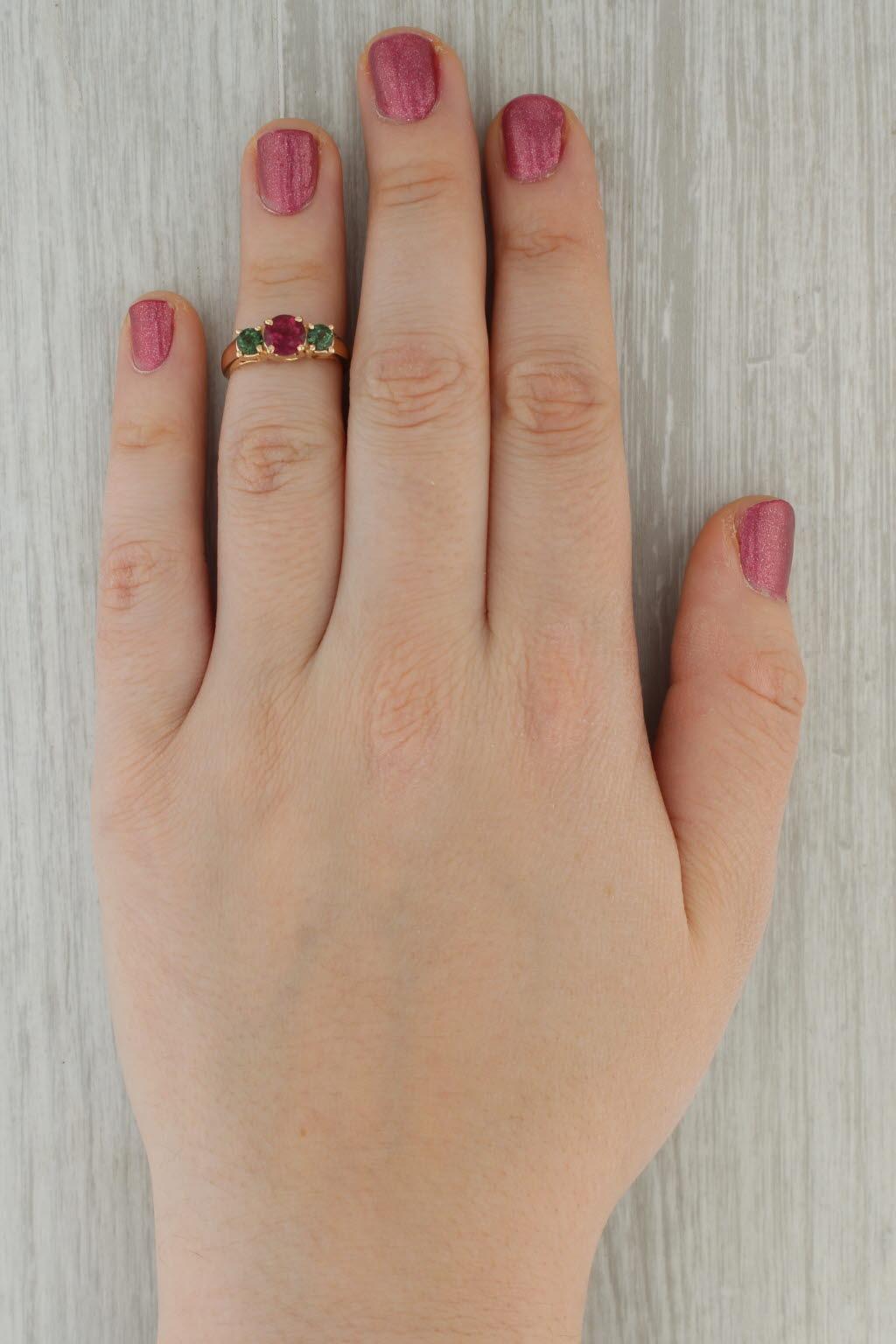 Gemstone Information:
- Natural Rubellite -
Carats - 0.97ct
Cut - Round Brilliant 
Color - Red 

- Natural Tourmalines -
Total Carats - 0.54ctw
Cut - Round Brilliant
Color - Green 

Metal: 14k Yellow Gold
Weight: 3.7 Grams 
Stamps: 14k
Face Height: