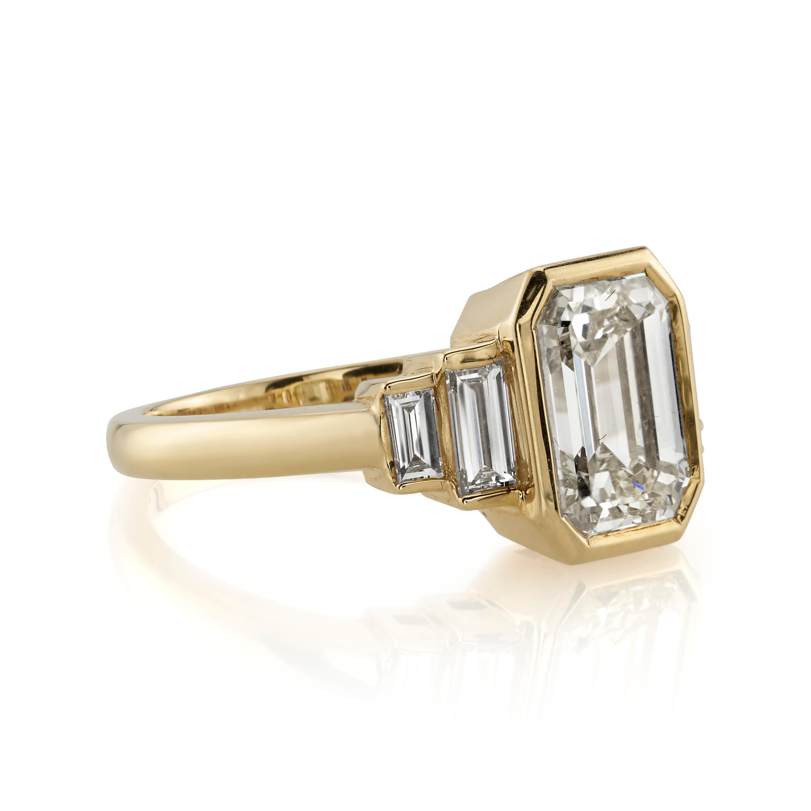 1.51ct H/SI1 EGL certified Emerald cut diamond with 0.38ctw baguette accents set in a handcrafted 18K yellow gold mounting. Ring is currently a size 6 and can be sized to fit.